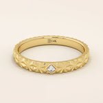 14k solid gold  geometric textured patterned slim unisex wedding band alliance with bezel set princess cut moissanite