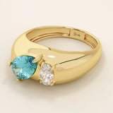 14k gold dome band ring with pear-shaped topaz and oval moissanite. A chunky Toi et Moi gemstone statement ring.