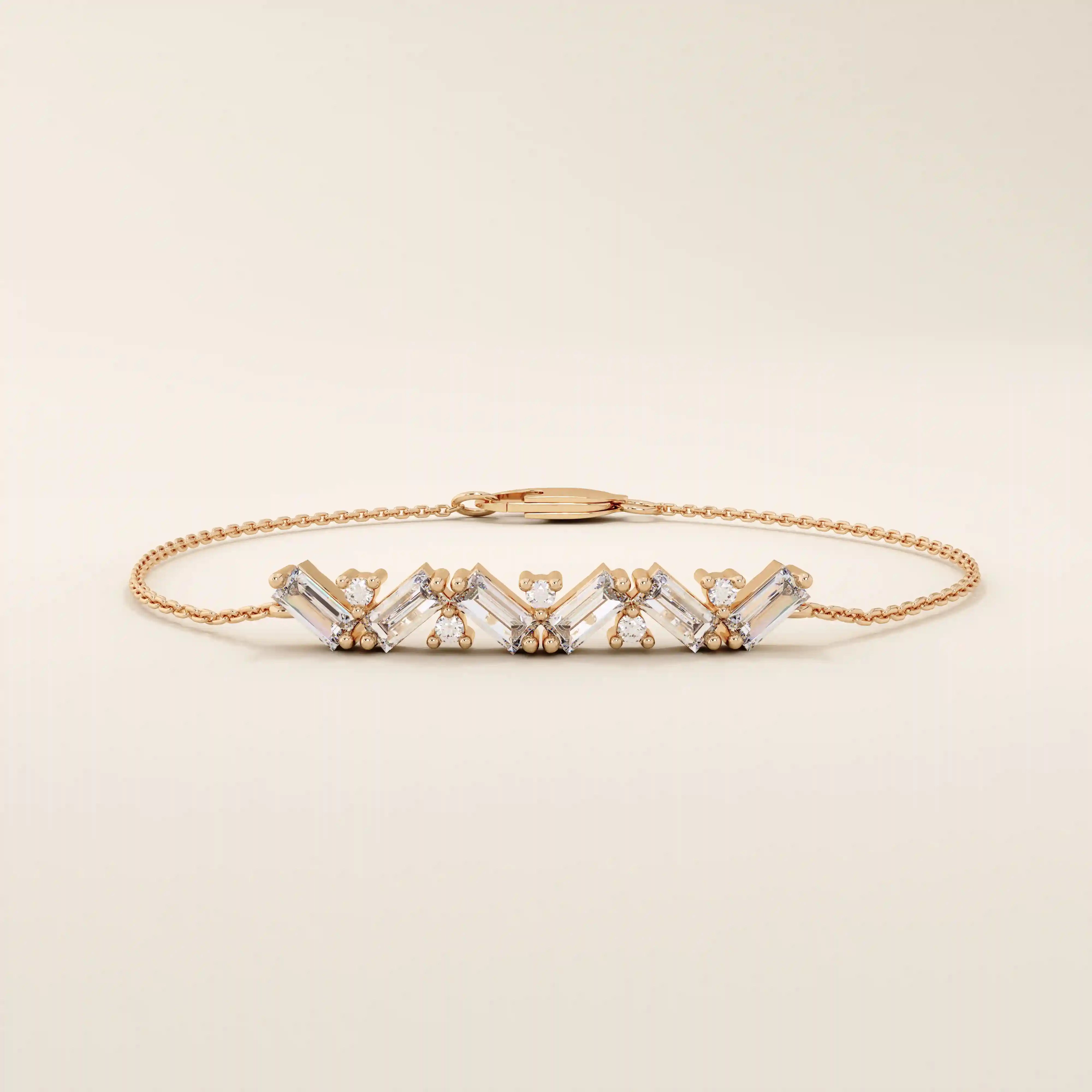 14k rose gold baguette bar bracelet showcasing baguette-cut stones paired with brilliant round stones on a delicate chain.