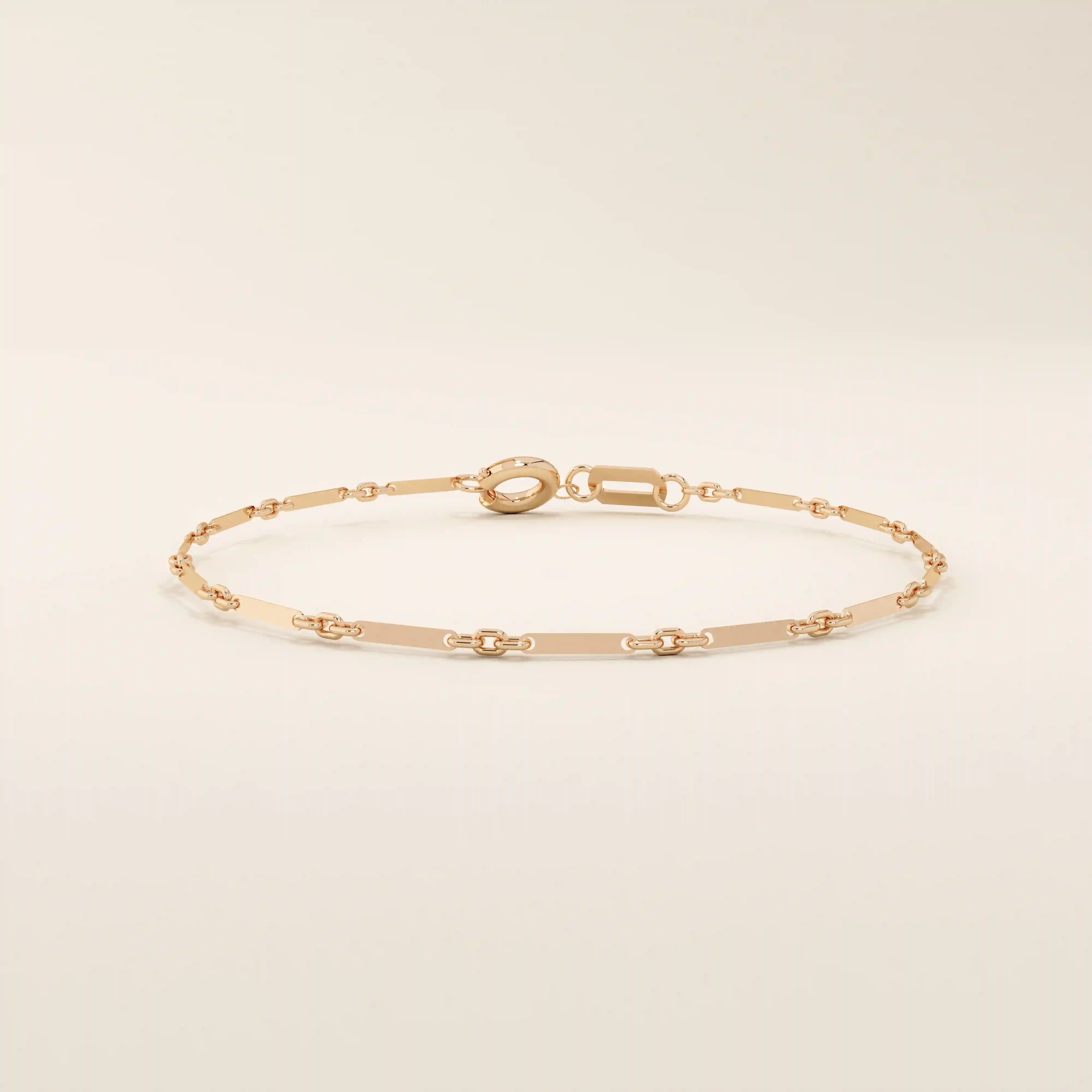 14k rose gold bracelet with alternating flat bar and oval cable chain links for a refined minimalist style.
