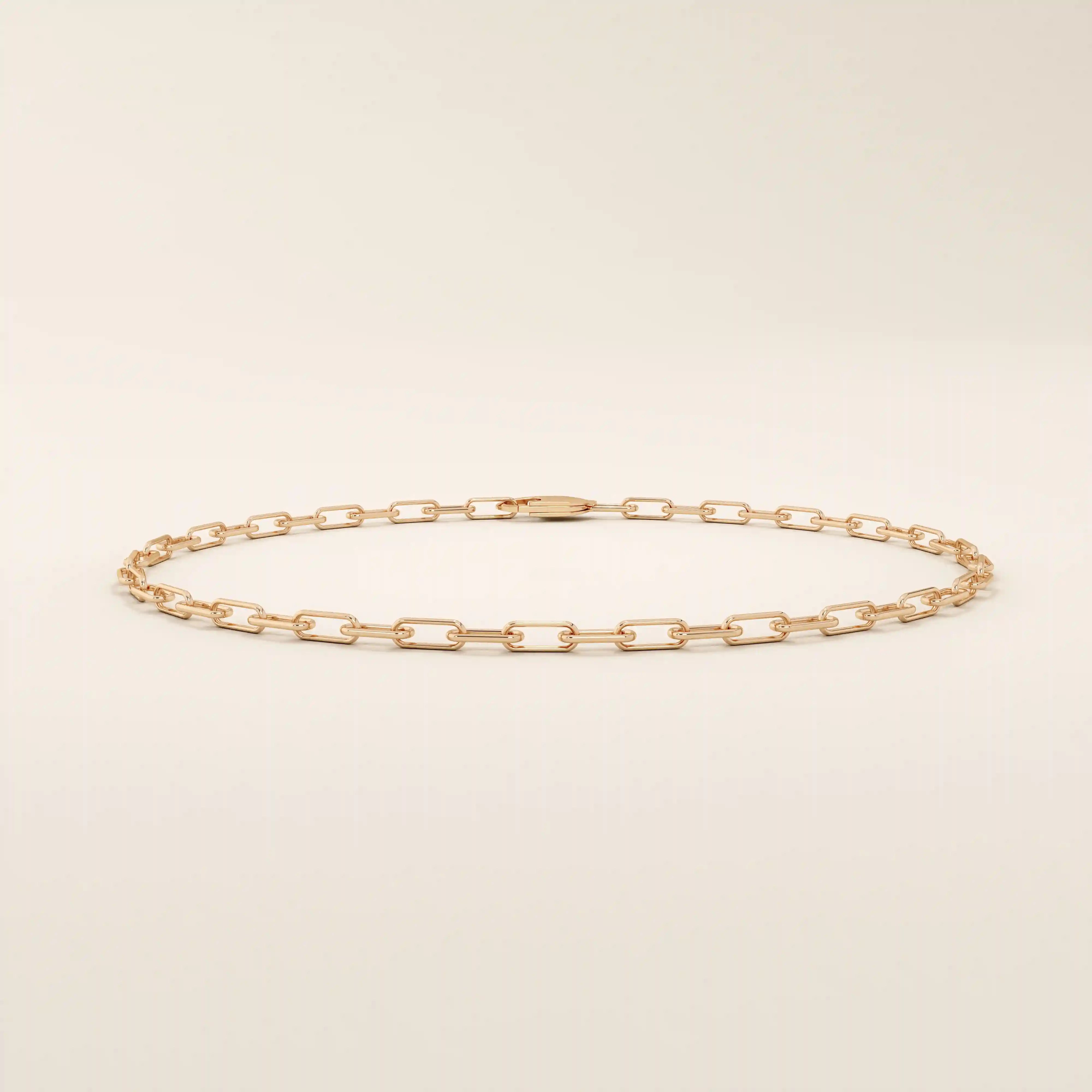 14k rose gold bracelet with slim elongated links in a minimalist chain style.