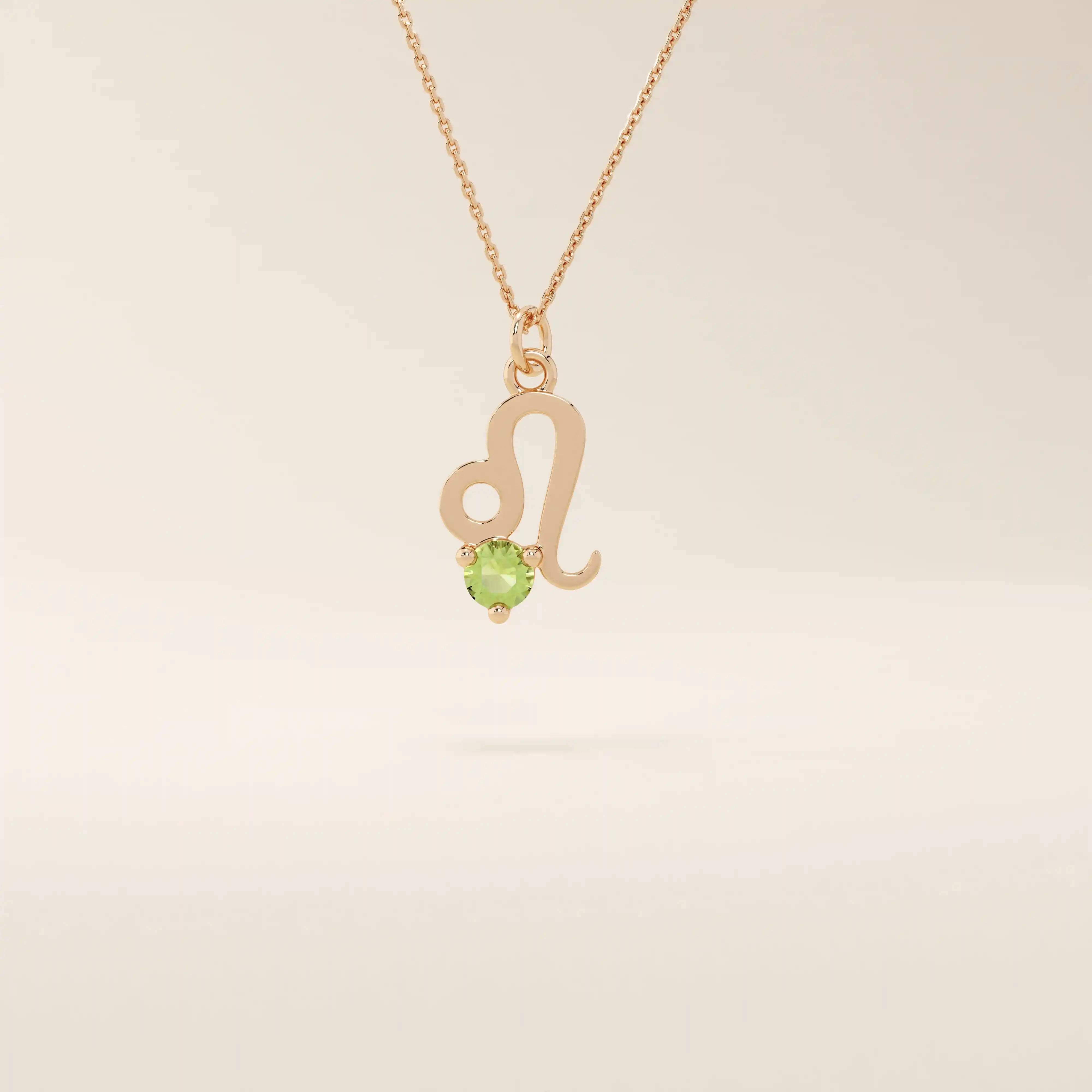 14k solid gold Leo zodiac symbol pendant necklace with a round green peridot, minimalist astrology birthstone jewelry.