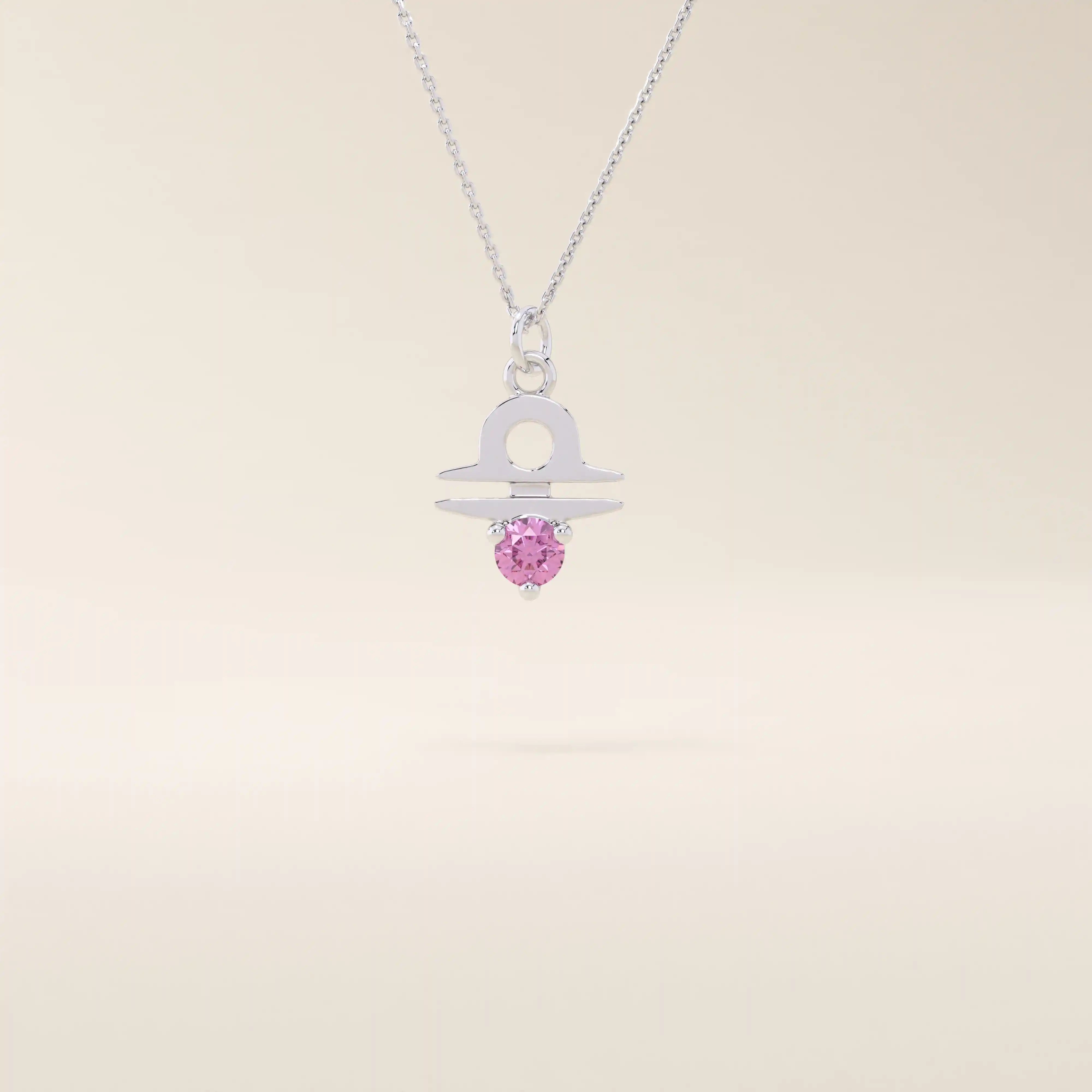 14k solid gold Libra zodiac symbol pendant necklace with a vibrant pink tourmaline. Minimalist astrology birthstone jewelry.
