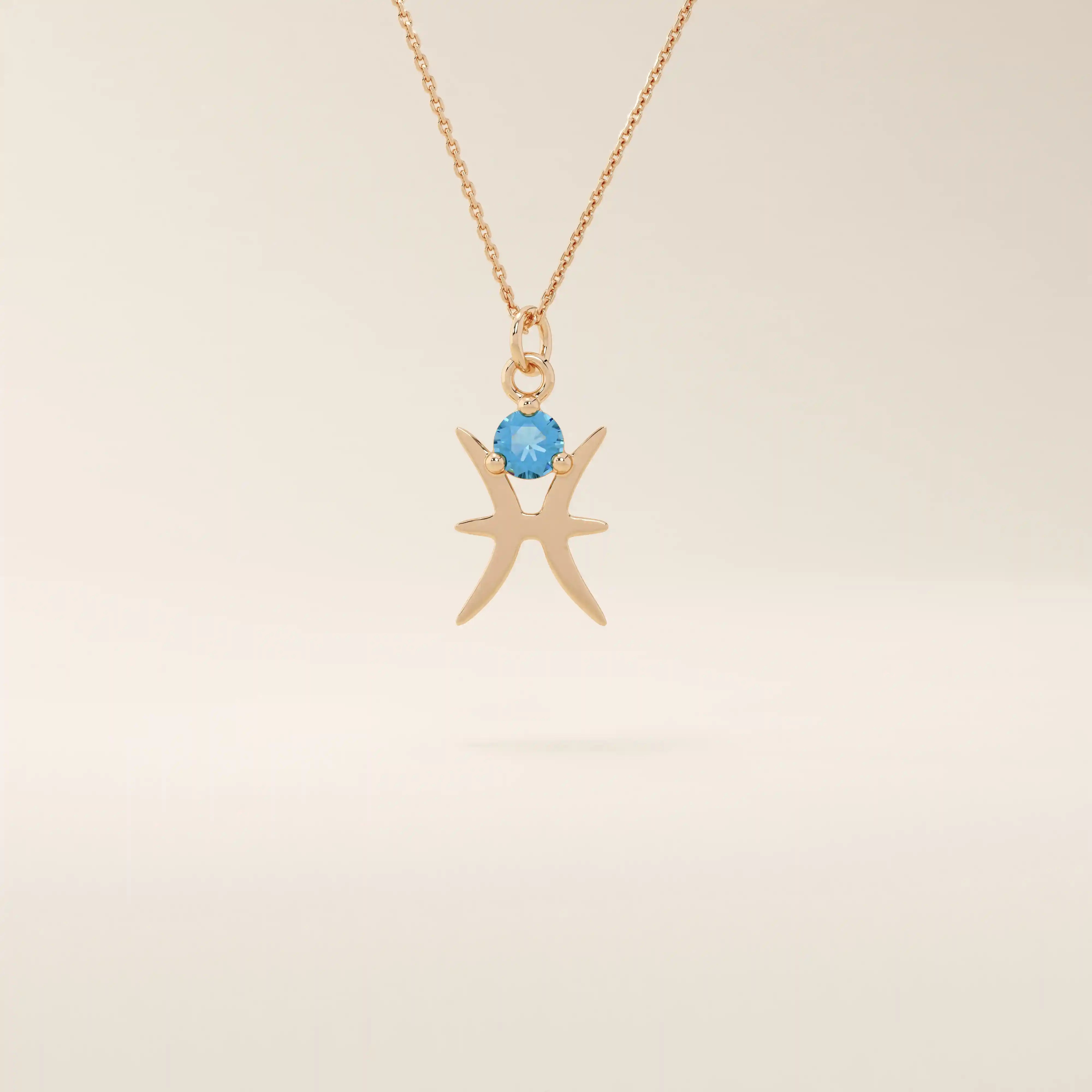 14k solid gold Pisces zodiac symbol pendant necklace with a round aquamarine, minimalist astrology birthstone jewelry.