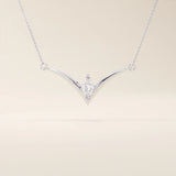 14k solid gold V-shape necklace with a marquise-cut moissanite at the center. Unique and modern gold necklace design. Dainty and minimalist jewelry for everyday wear.