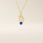 14k solid gold Virgo zodiac symbol pendant necklace with a round blue sapphire, minimalist astrology birthstone jewelry.