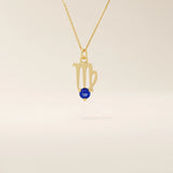 14k solid gold Virgo zodiac symbol pendant necklace with a round blue sapphire, minimalist astrology birthstone jewelry.