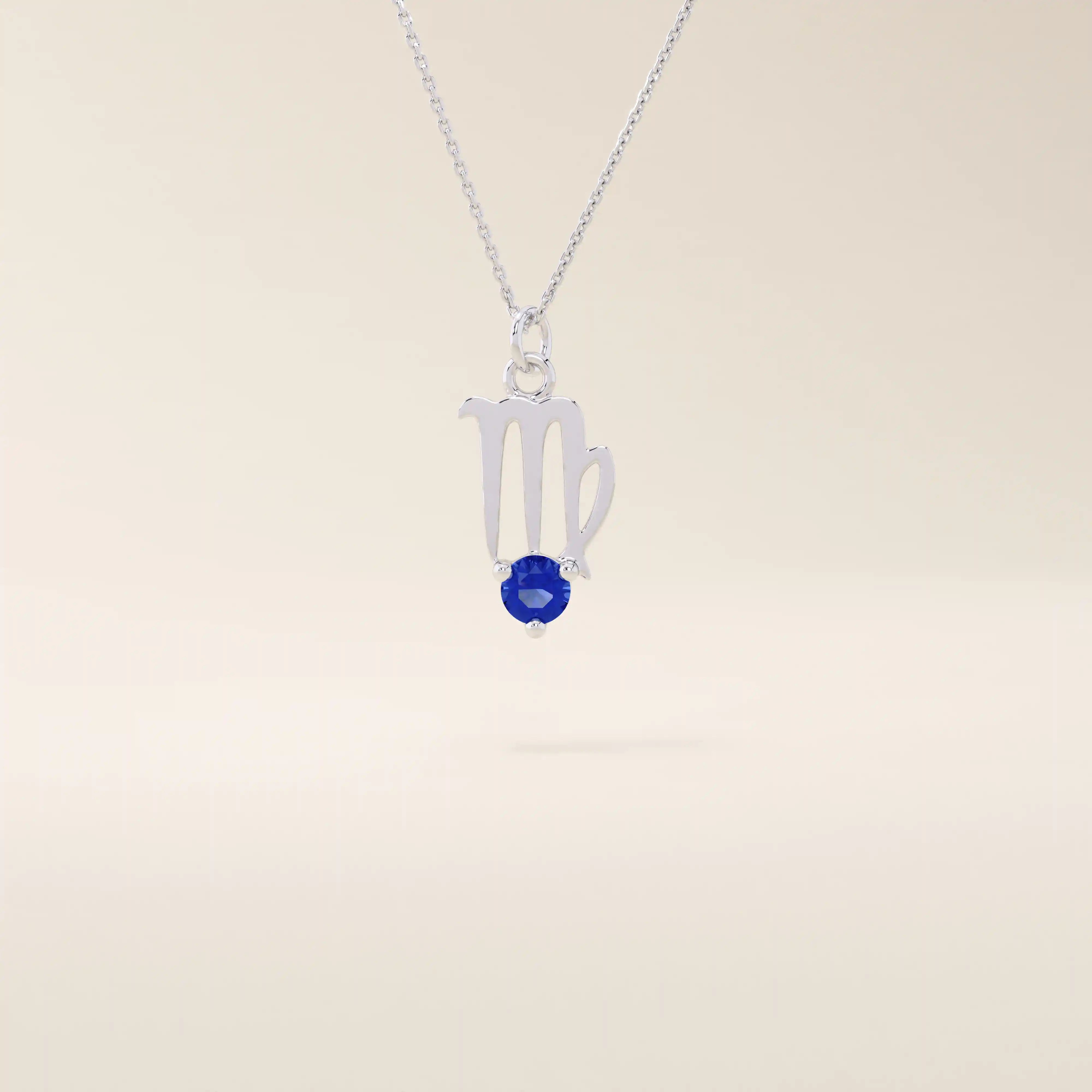 14k solid gold Virgo zodiac symbol pendant necklace with a round blue sapphire, minimalist astrology birthstone jewelry.