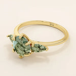 14k solid gold chunky ring with a natural moss agate gemstone. Unique and earthy anniversary jewelry design.