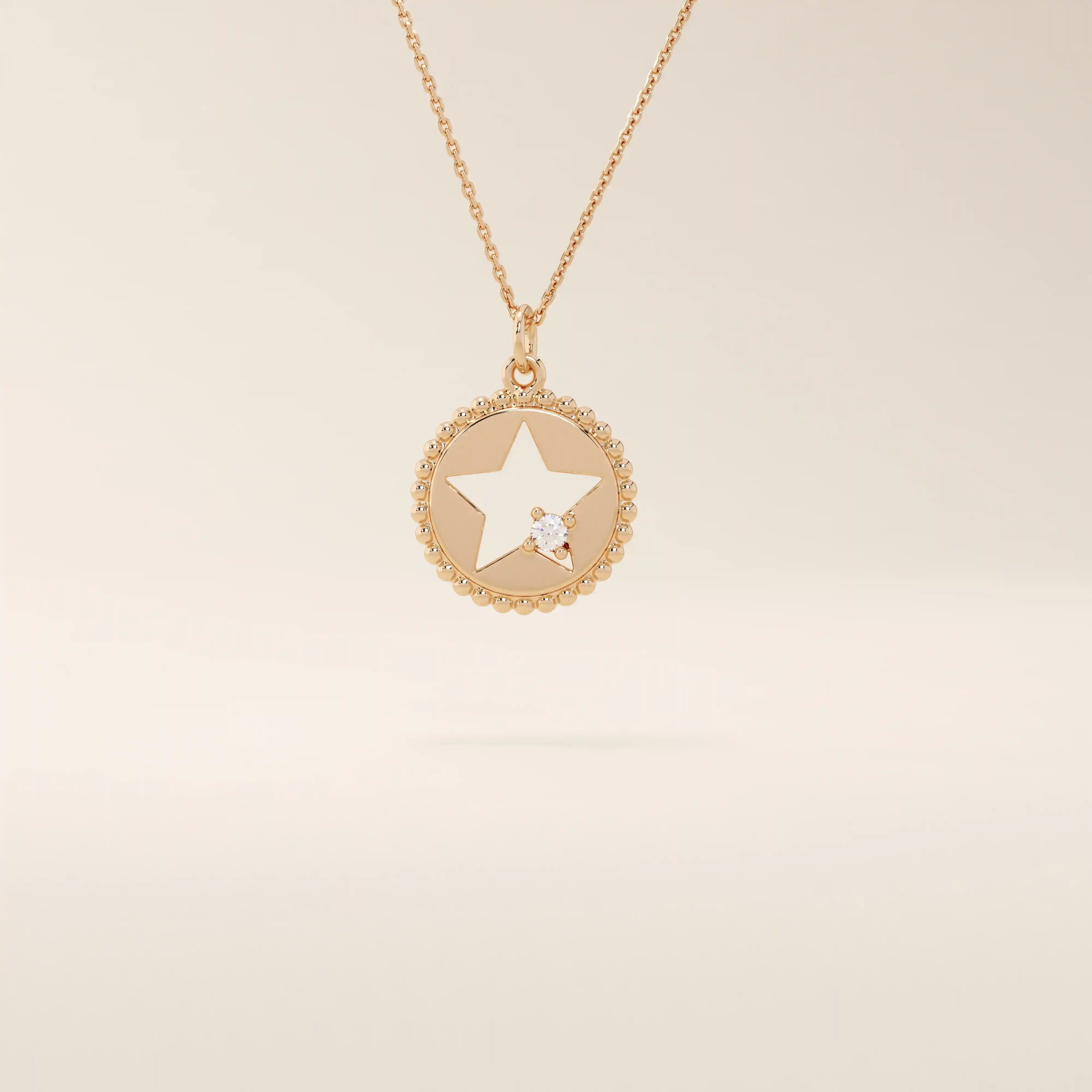 14k solid gold circle pendant necklace featuring a star-shaped cutout and a single sparkling moissanite. Delicate and celestial-inspired design.