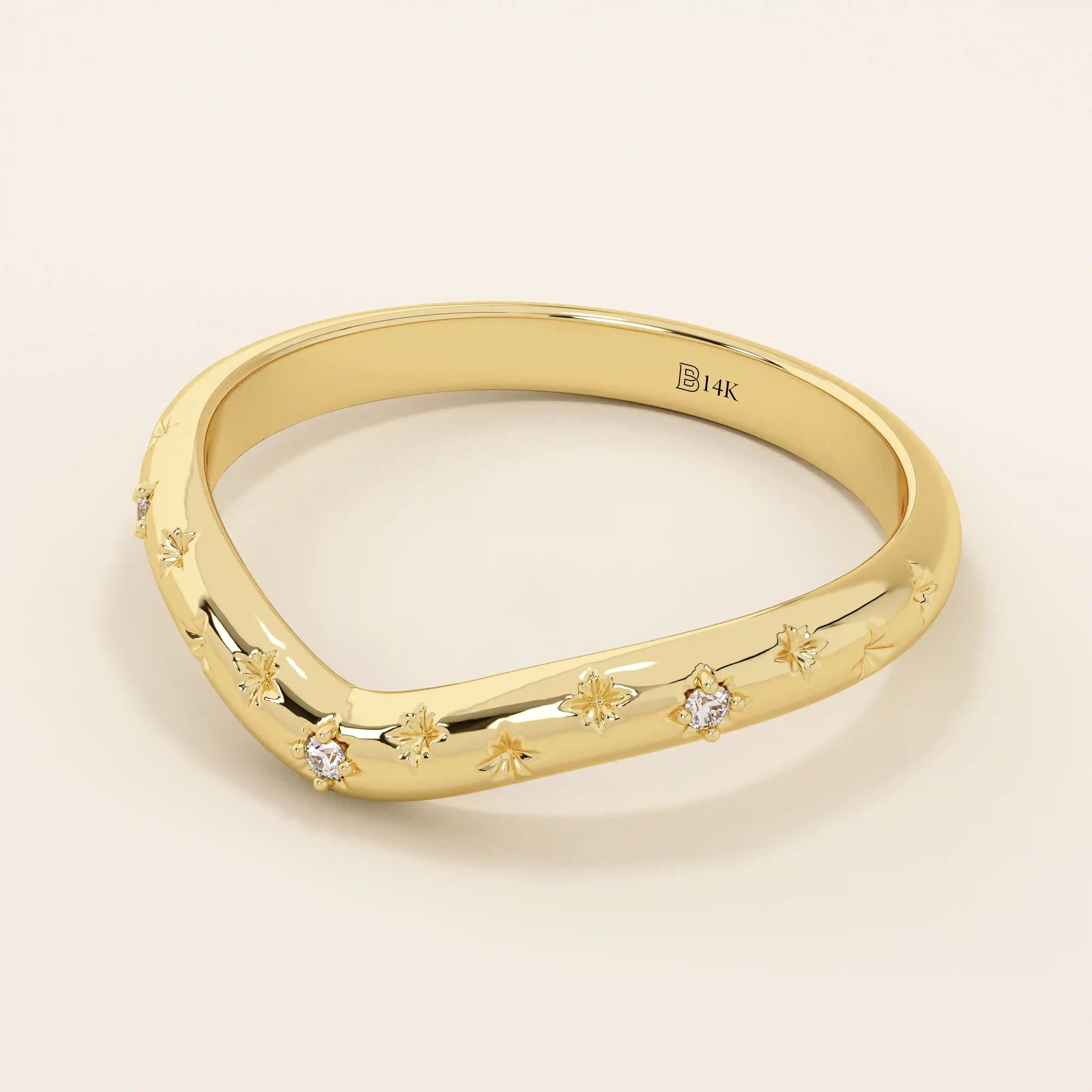 14k solid gold curved nesting ring featuring pavé moissanite star motifs. A celestial-inspired design perfect for stacking with engagement rings.