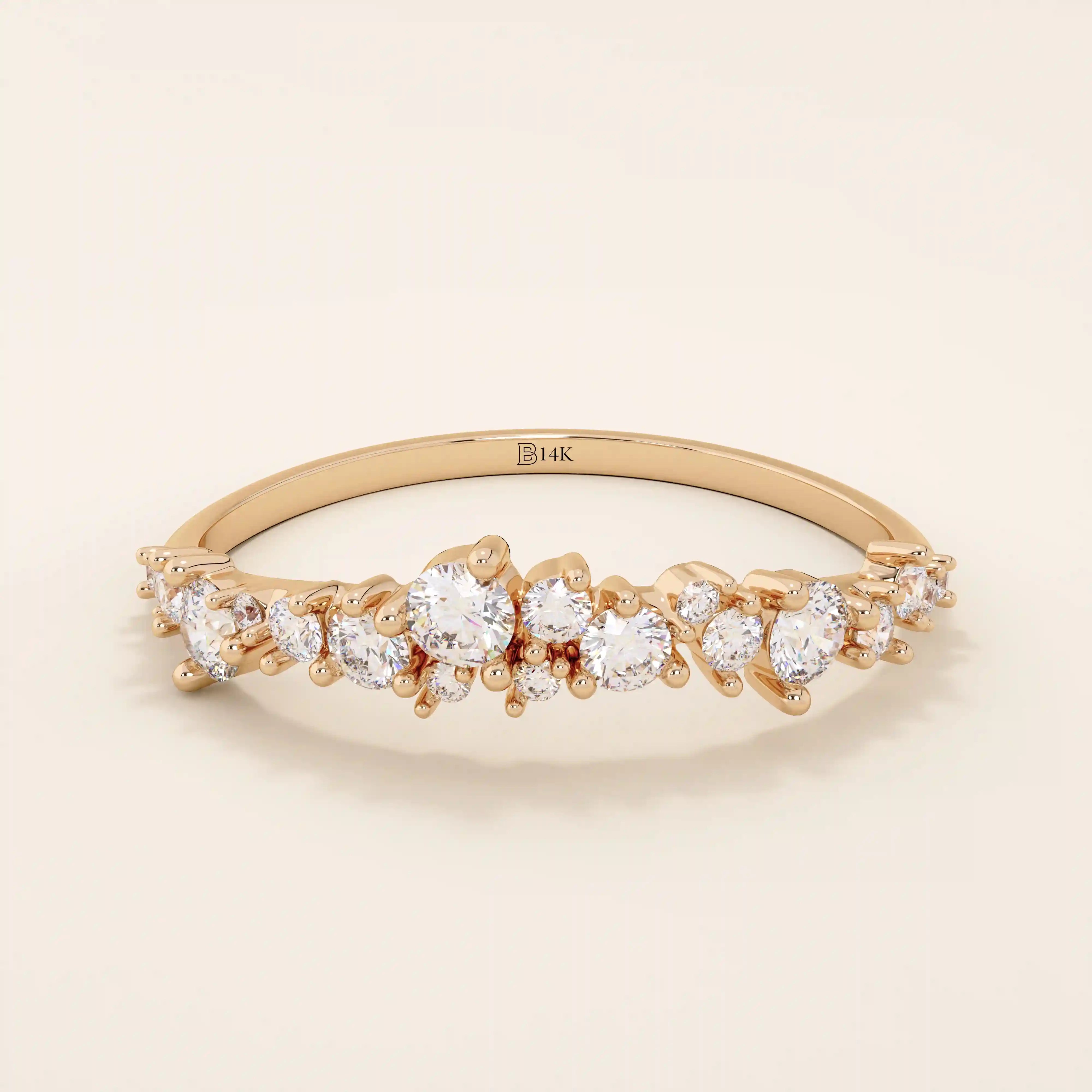 14k solid gold curved stackable wedding ring with cluster-pave moissanites. Minimalist yet sparkling design, perfect for stacking or as a wedding band.