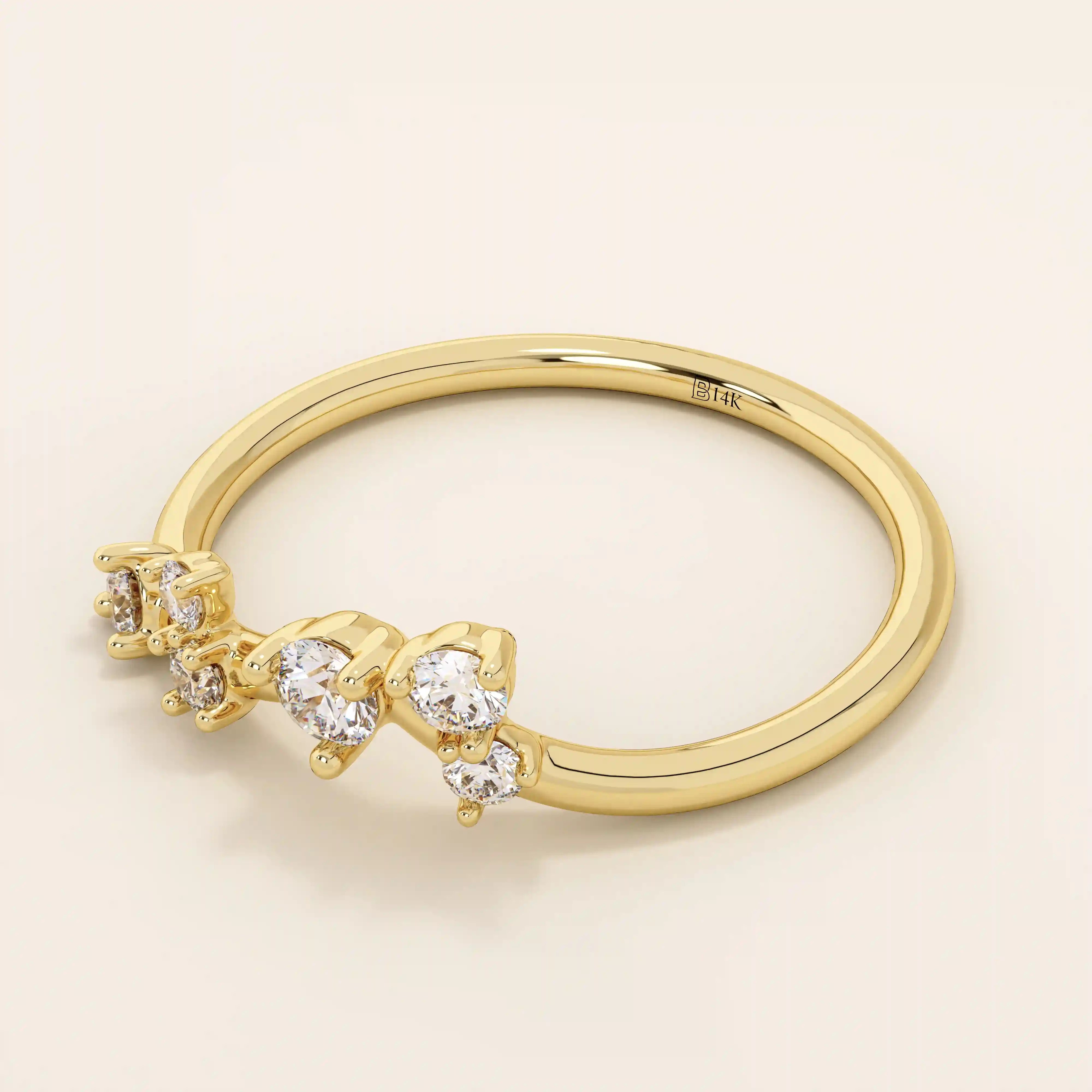 14k solid gold curved stacking ring with scattered moissanite accents. Designed to nest perfectly with solitaires or wear solo with sparkle.