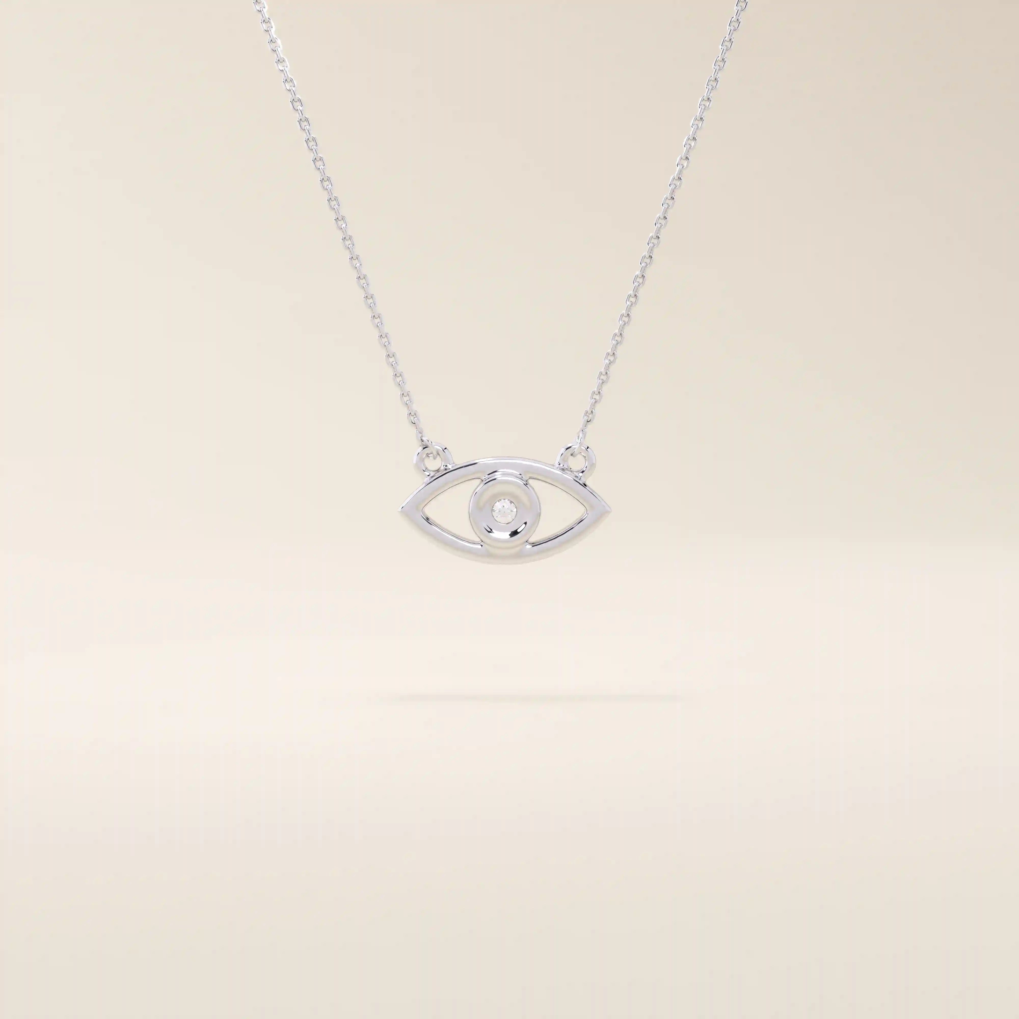 14k solid gold evil eye necklace with a minimalist eye shape and smooth polished finish. A protective and meaningful gold piece. Perfect for everyday wear or gifting.