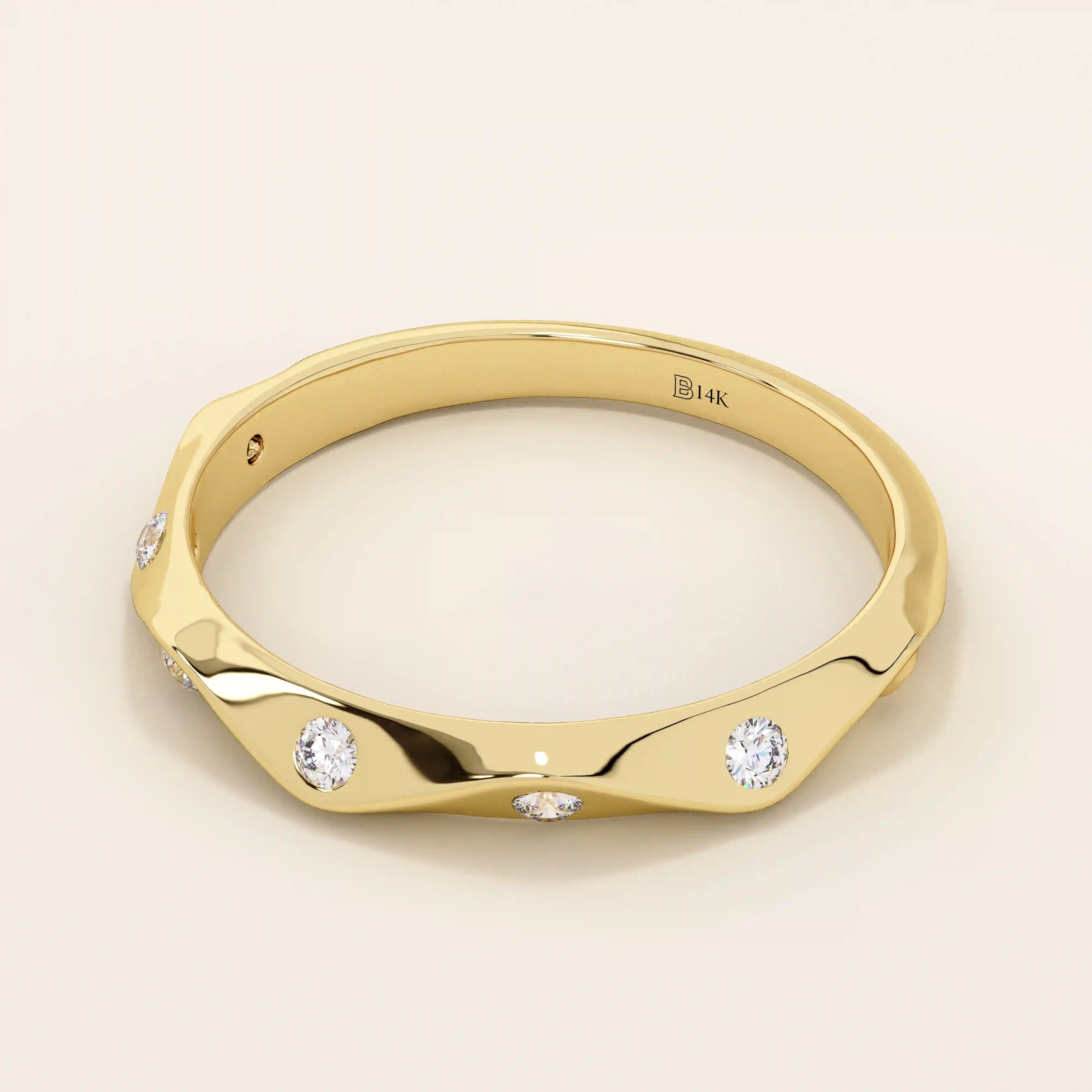 14k solid gold faceted band wedding ring adorned with tiny moissanite stones. Minimalist and sparkling design for everyday wear or stacking.