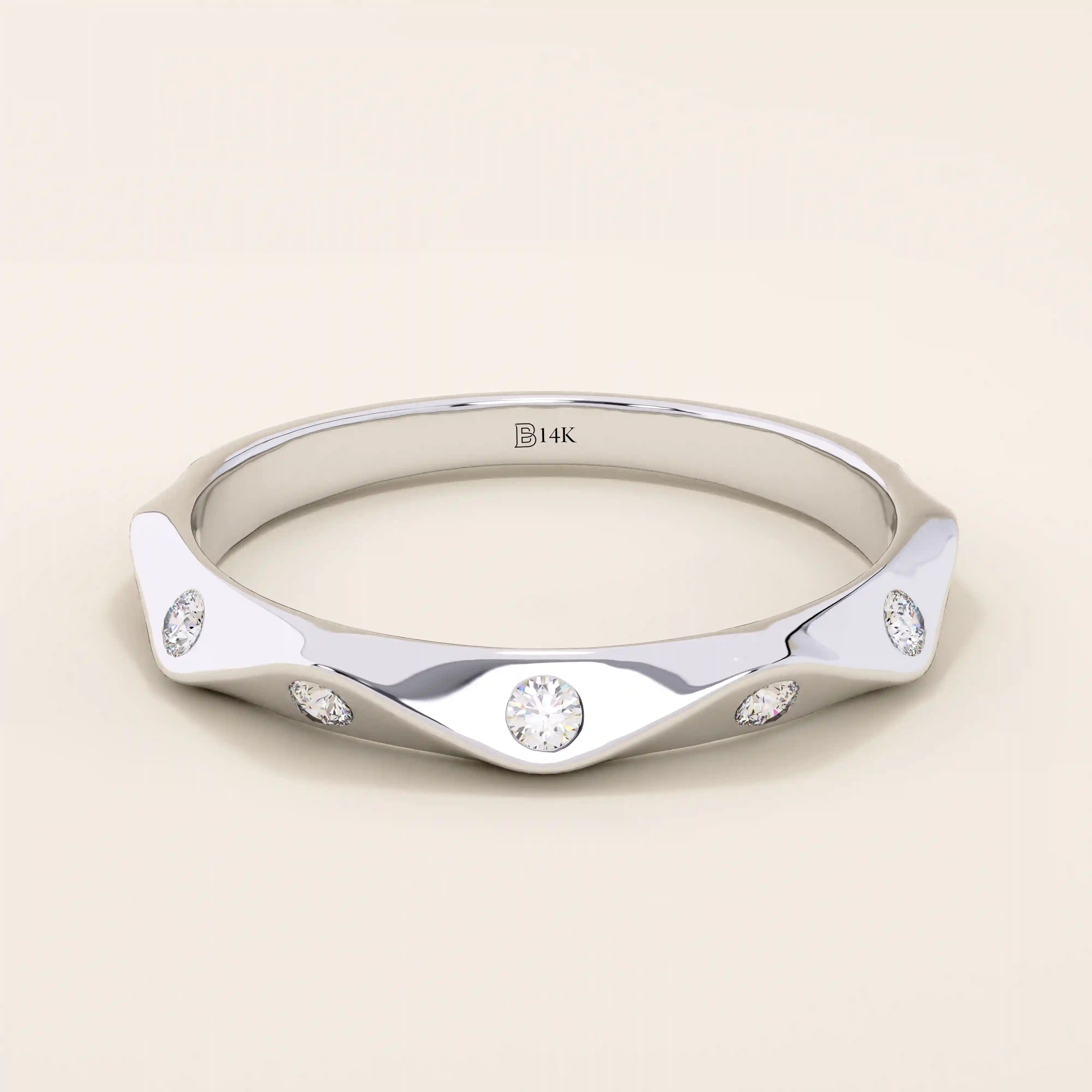 14k solid gold faceted band wedding ring adorned with tiny moissanite stones. Minimalist and sparkling design for everyday wear or stacking.