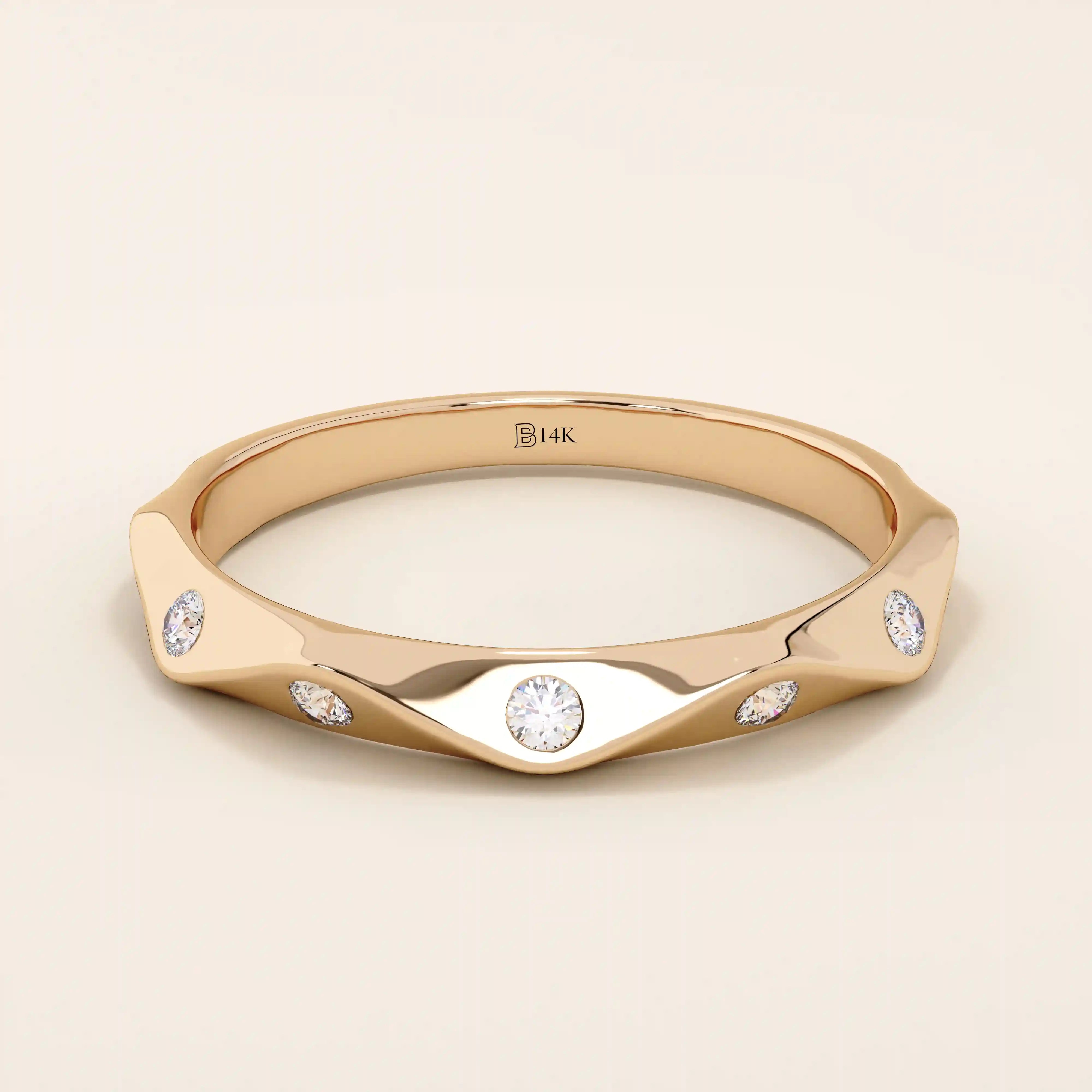 14k solid gold faceted band wedding ring adorned with tiny moissanite stones. Minimalist and sparkling design for everyday wear or stacking.