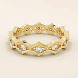 14k solid gold geometric eternity band ring featuring rhombus shapes adorned with sparkling moissanites. Bold and modern design.