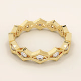 14k solid gold geometric eternity band ring featuring rhombus shapes adorned with sparkling moissanites. Bold and modern design.