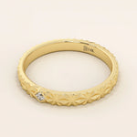 14k solid gold  geometric textured patterned slim unisex wedding band alliance with bezel set princess cut moissanite