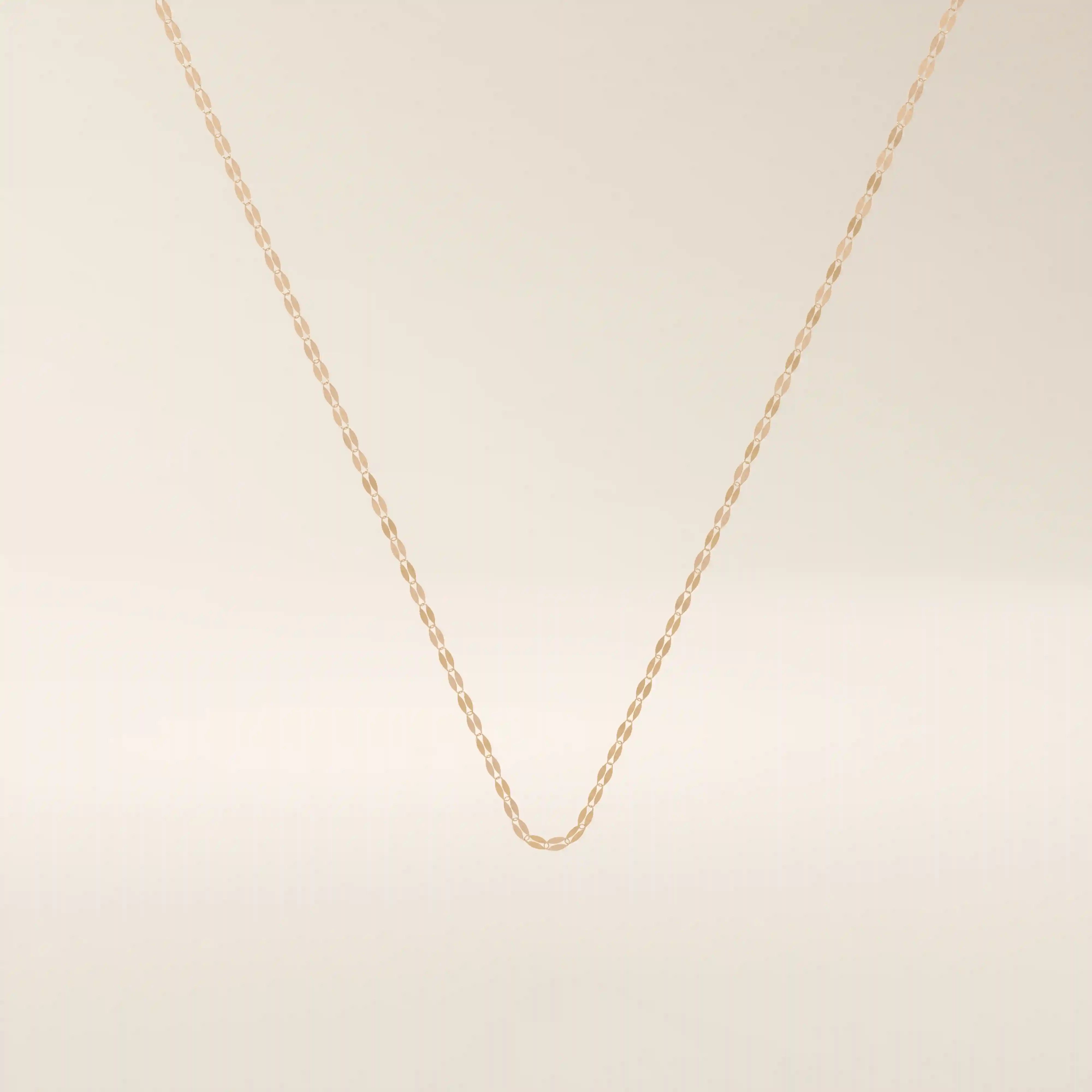 14k solid gold lip chain necklace with a soft curved link design. A unique and modern gold chain. Great for layering or wearing every day.