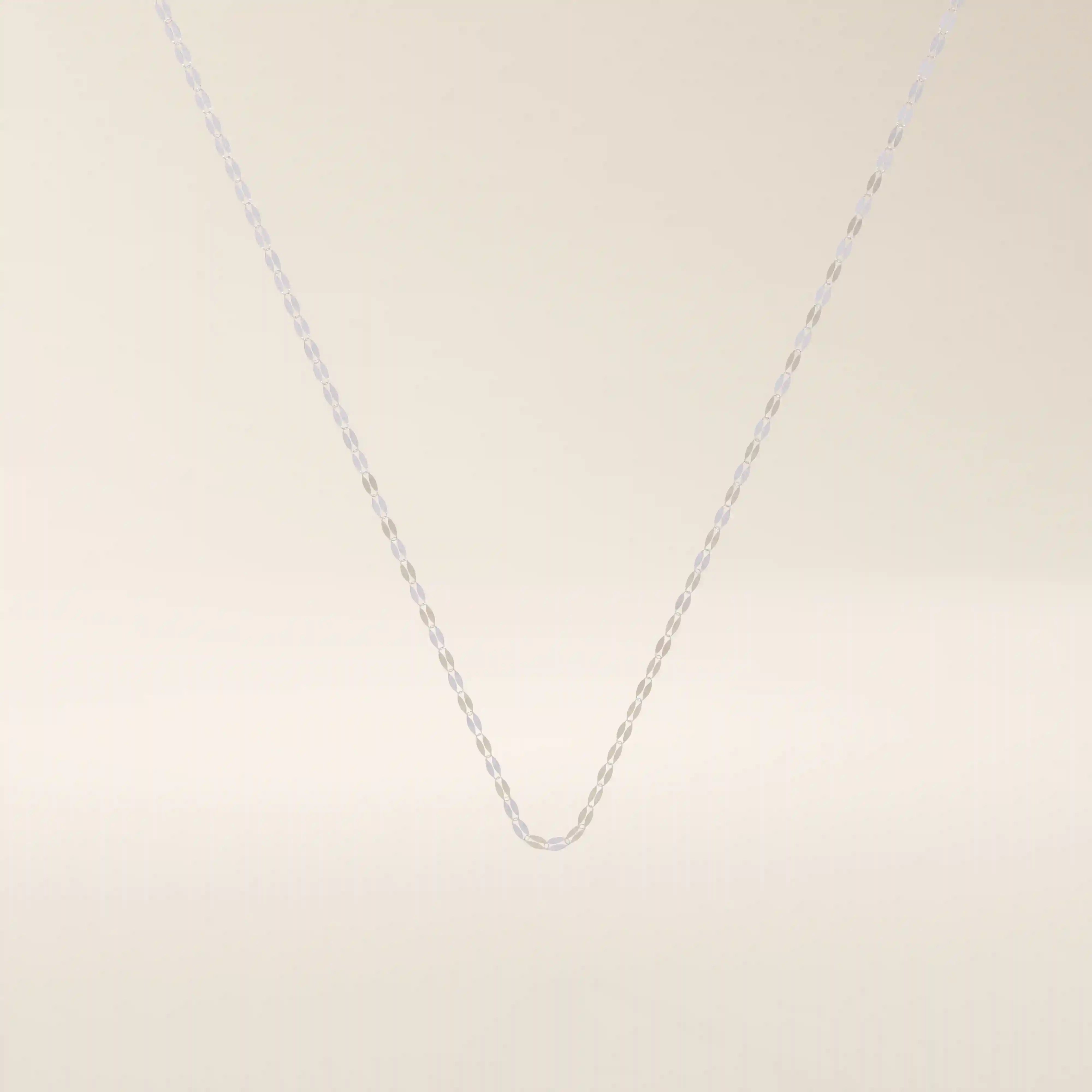 14k solid gold lip chain necklace with a soft curved link design. A unique and modern gold chain. Great for layering or wearing every day.