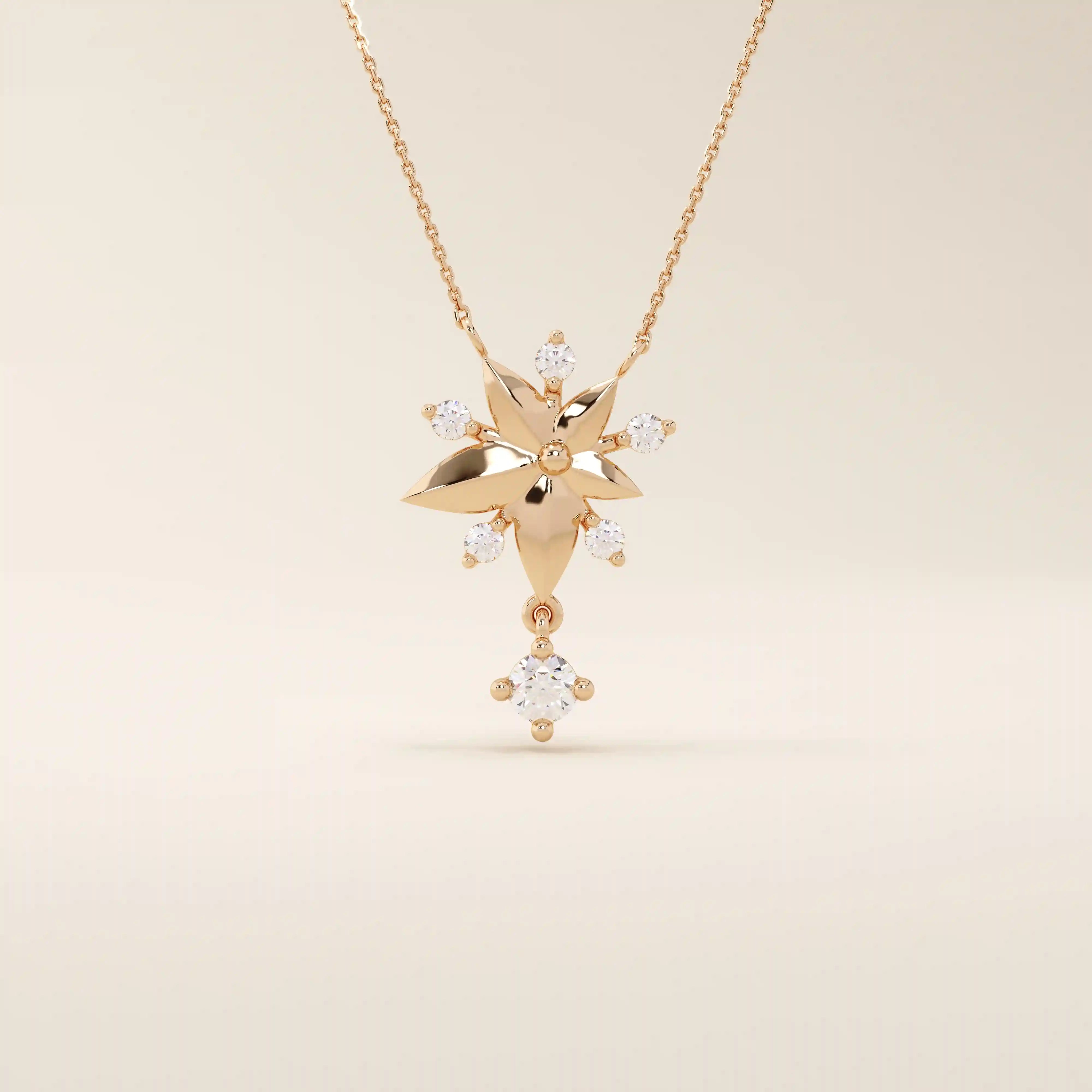 14k solid gold necklace featuring a 5-petal flower design with a dangling moissanite. Feminine and delicate floral jewelry. Ideal for everyday elegance.