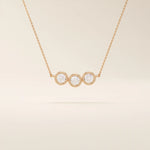 14k solid gold necklace featuring three bezel-set moissanite stones. A minimalist and stackable design perfect for layering everyday jewelry.