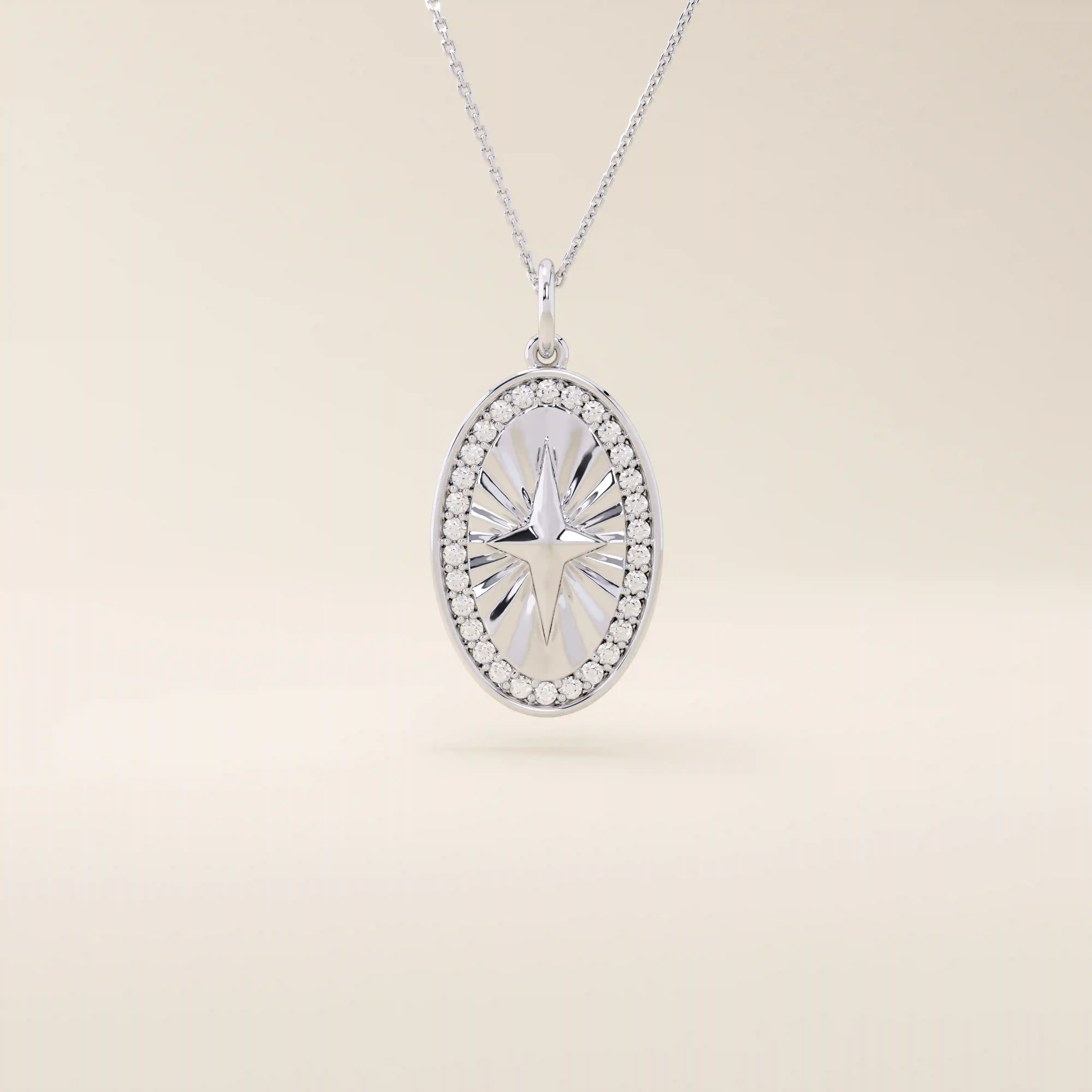 14k solid gold oval compass pendant necklace with pave moissanite stones around and a 4-point star design in the center. Elegant and symbolic gold jewelry. Perfect for daily wear.