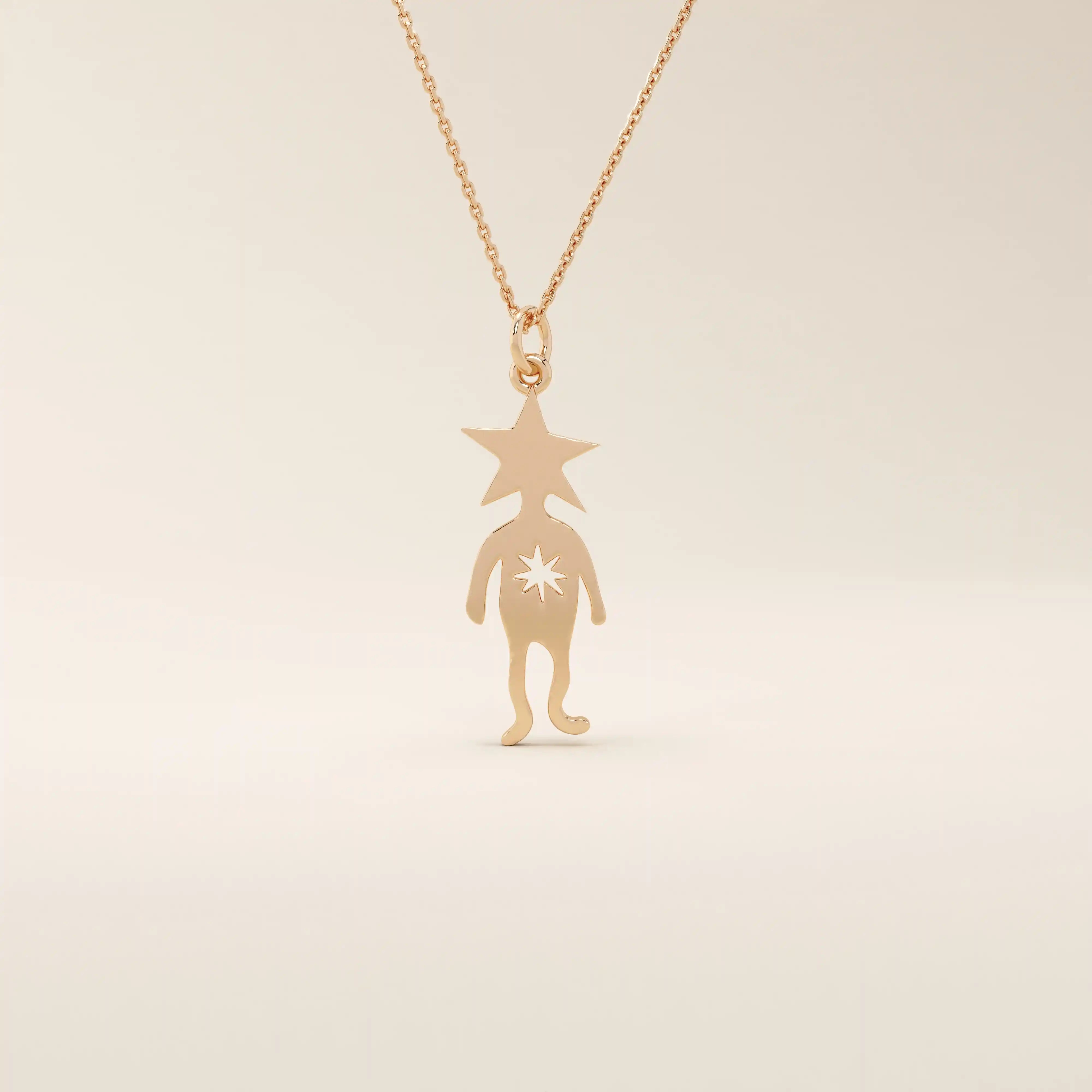 14k solid gold pendant necklace featuring a star-shaped head charm designed for little boys. Simple and charming everyday accessory.