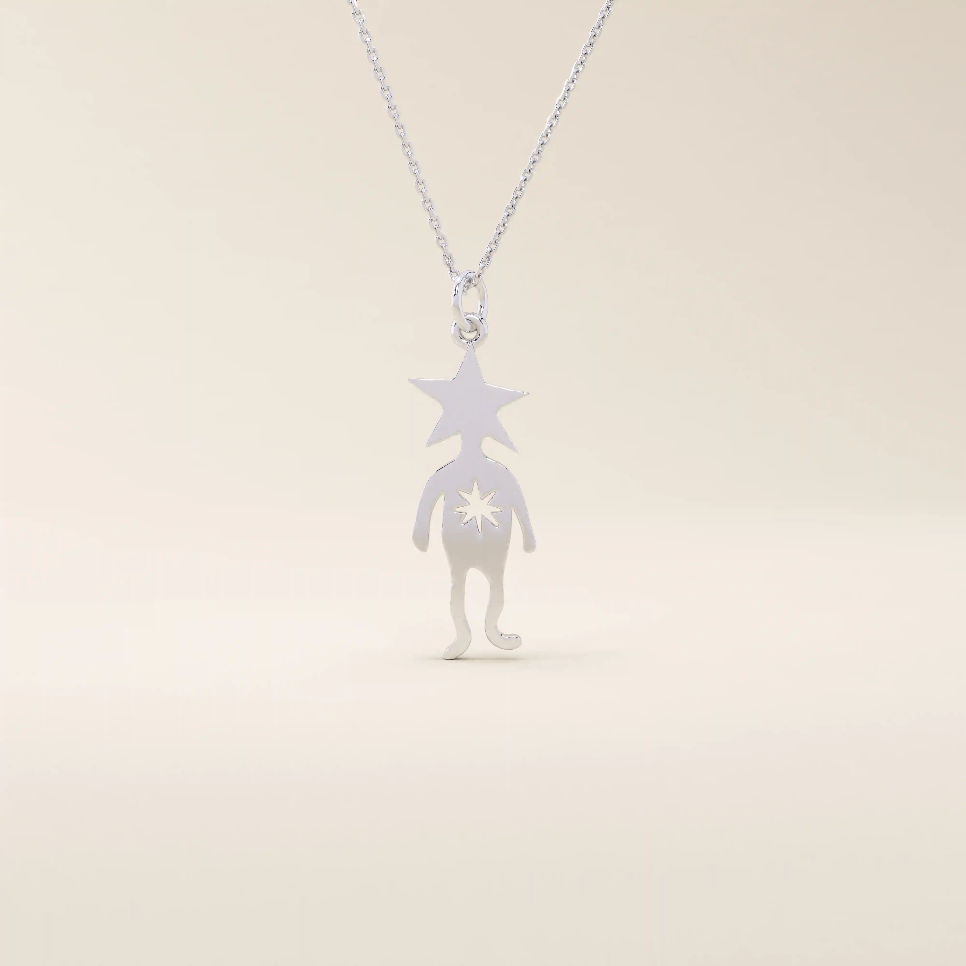 14k solid gold pendant necklace featuring a star-shaped head charm designed for little boys. Simple and charming everyday accessory.