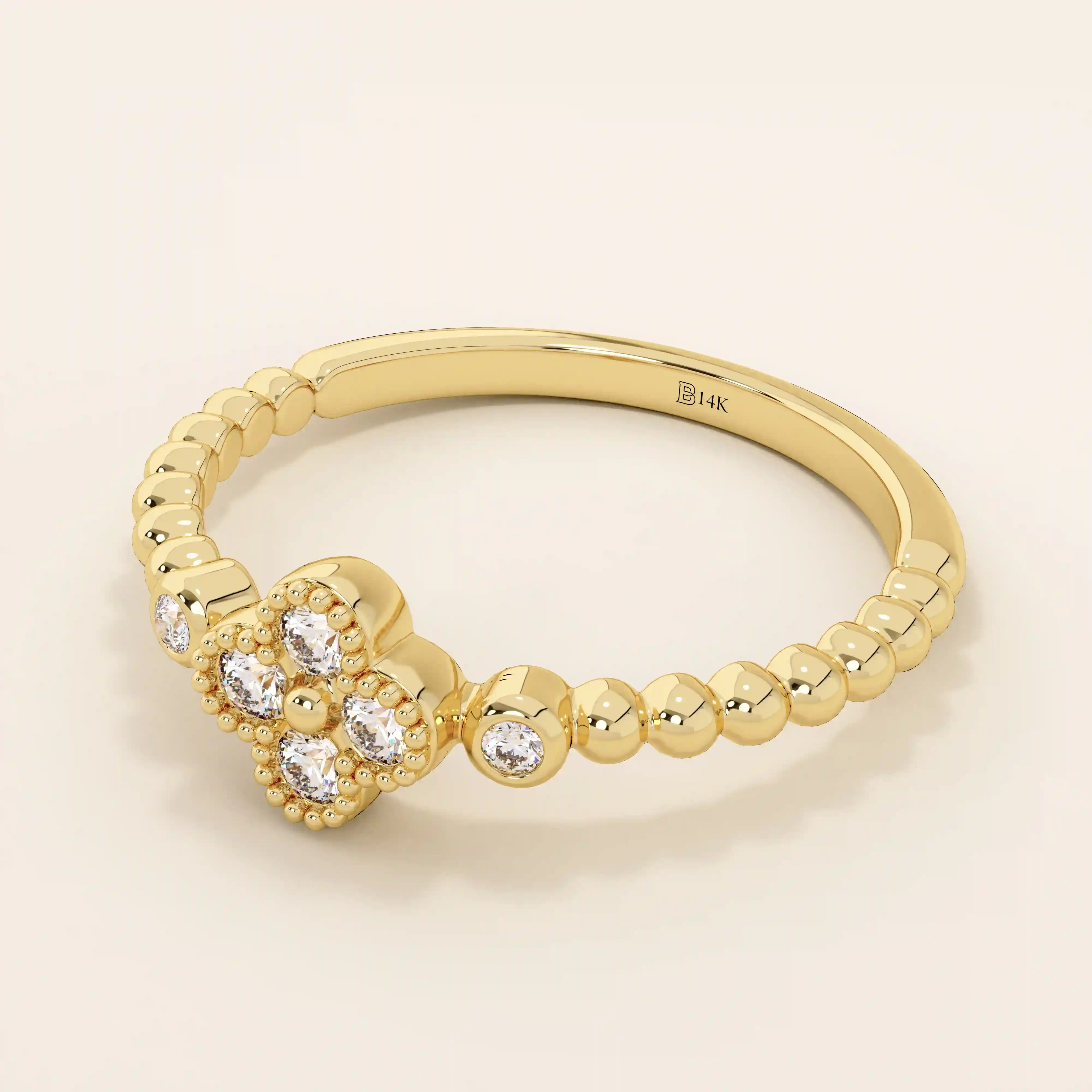 14k solid gold pinky signet ring with a beaded band and clover-shaped moissanite centerpiece. A delicate and symbolic design for women.