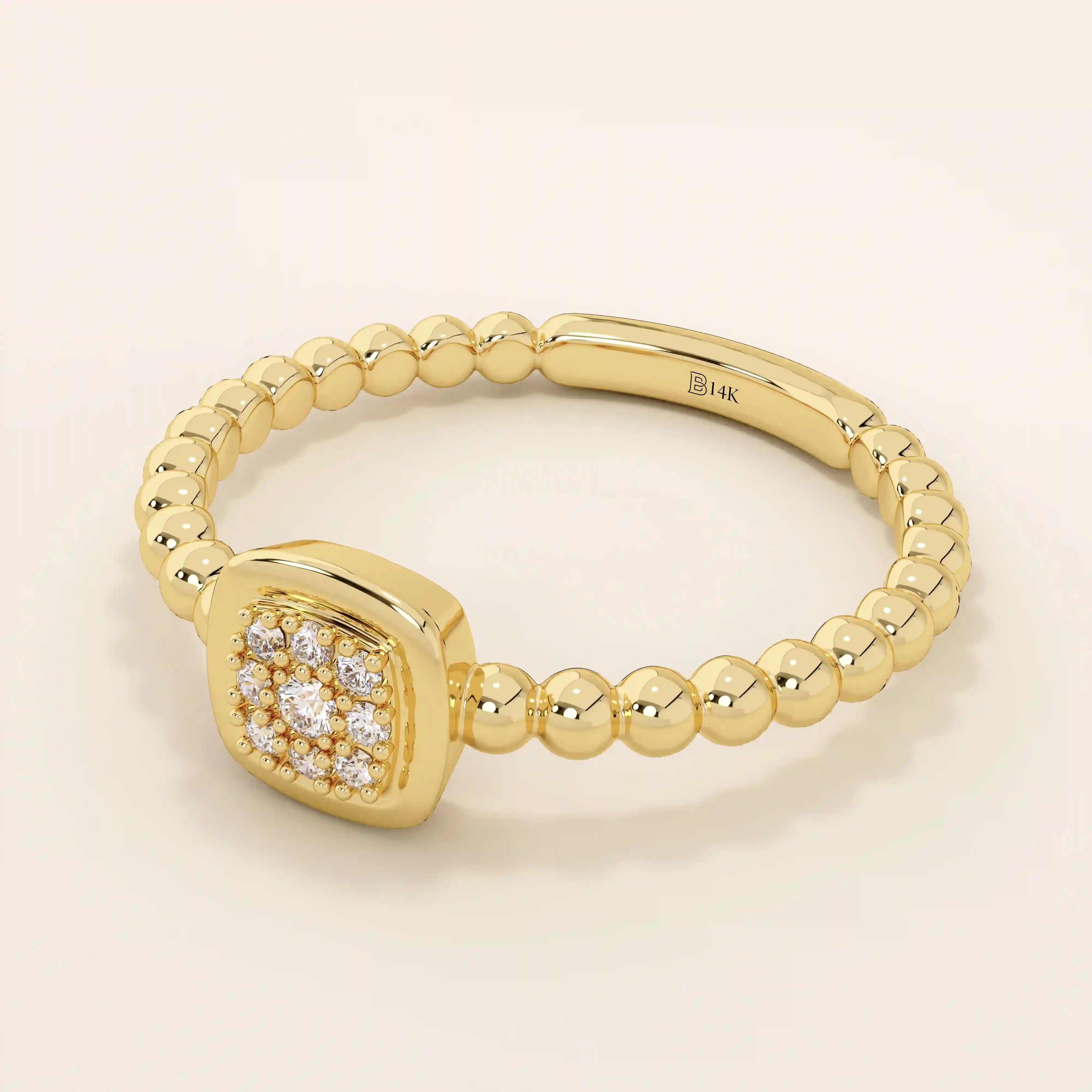 14k solid gold pinky signet ring with a square face and textured beaded band. A modern and elegant minimalist design.