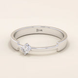 14k solid gold promise ring featuring a unique design with a single sparkling moissanite stone. Modern and elegant for everyday wear.