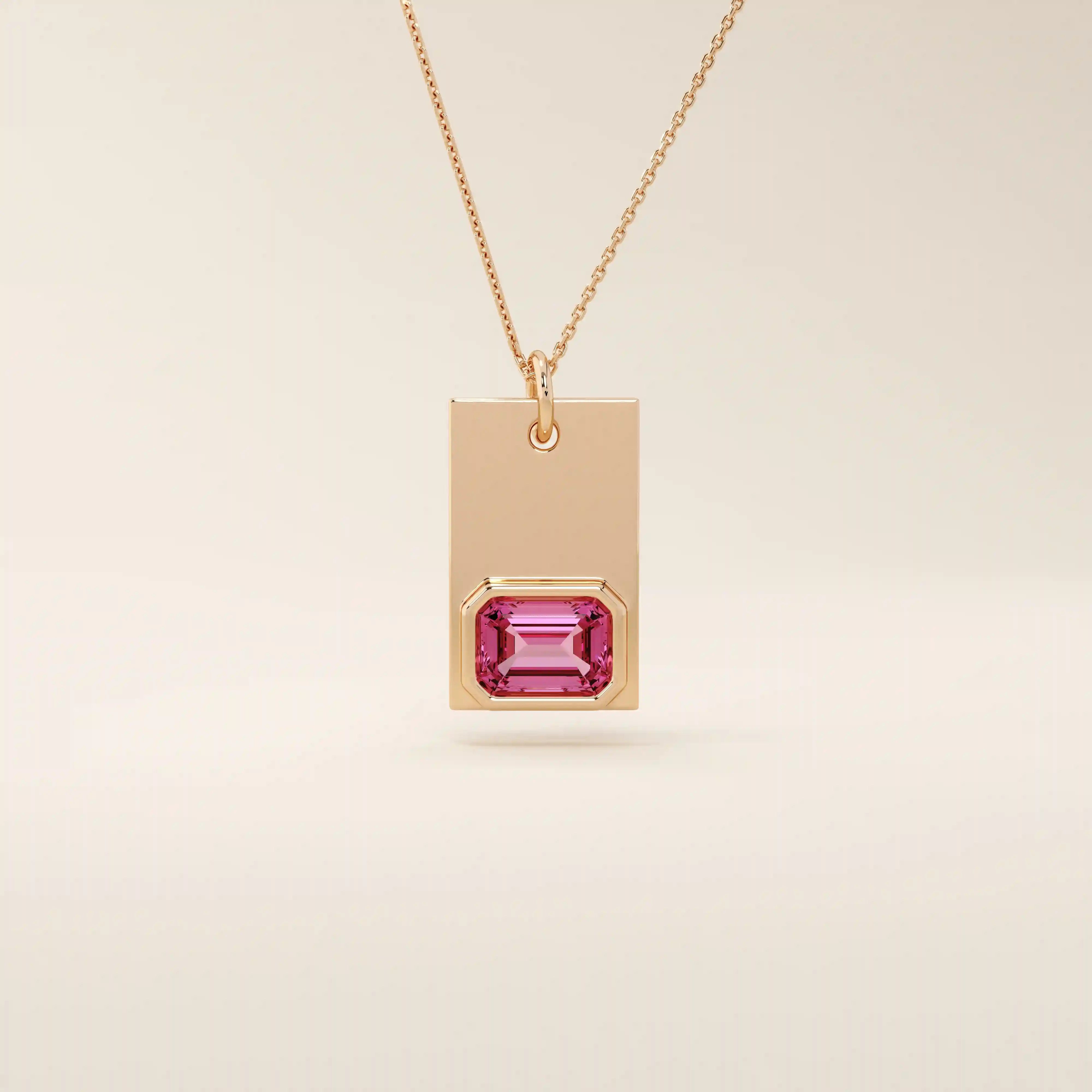 14k solid gold rectangle pendant with a bezel-set emerald-cut lab-grown ruby. A bold yet refined birthstone necklace with clean lines and rich red hue. Perfect for gifting or layering as meaningful fine jewelry.