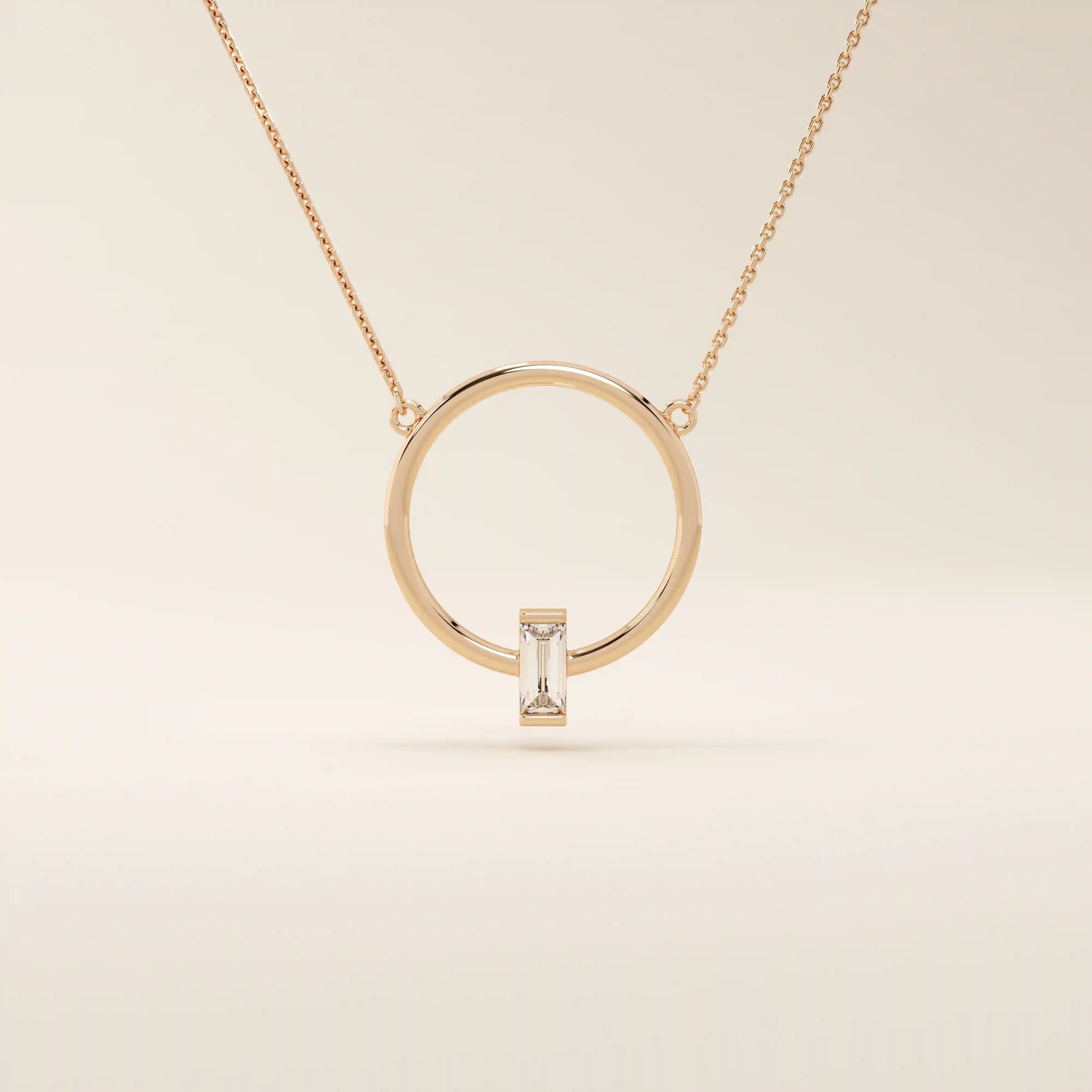 14k solid gold round necklace with a unique karma-inspired shape and central baguette-cut moissanite. Symbolic and modern gold jewelry. Ideal for minimalist everyday style.