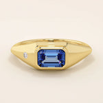 14k solid gold signet ring with a bezel set deep blue sapphire gemstone. A classic silhouette with a bold, modern twist. Ideal as a pinky ring or statement piece.