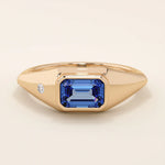 14k solid gold signet ring with a bezel set deep blue sapphire gemstone. A classic silhouette with a bold, modern twist. Ideal as a pinky ring or statement piece.