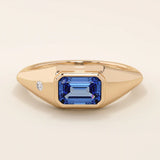 14k solid gold signet ring with a bezel set deep blue sapphire gemstone. A classic silhouette with a bold, modern twist. Ideal as a pinky ring or statement piece.