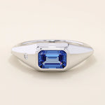 14k solid gold signet ring with a bezel set deep blue sapphire gemstone. A classic silhouette with a bold, modern twist. Ideal as a pinky ring or statement piece.