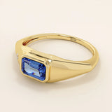 14k solid gold signet ring with a bezel set deep blue sapphire gemstone. A classic silhouette with a bold, modern twist. Ideal as a pinky ring or statement piece.