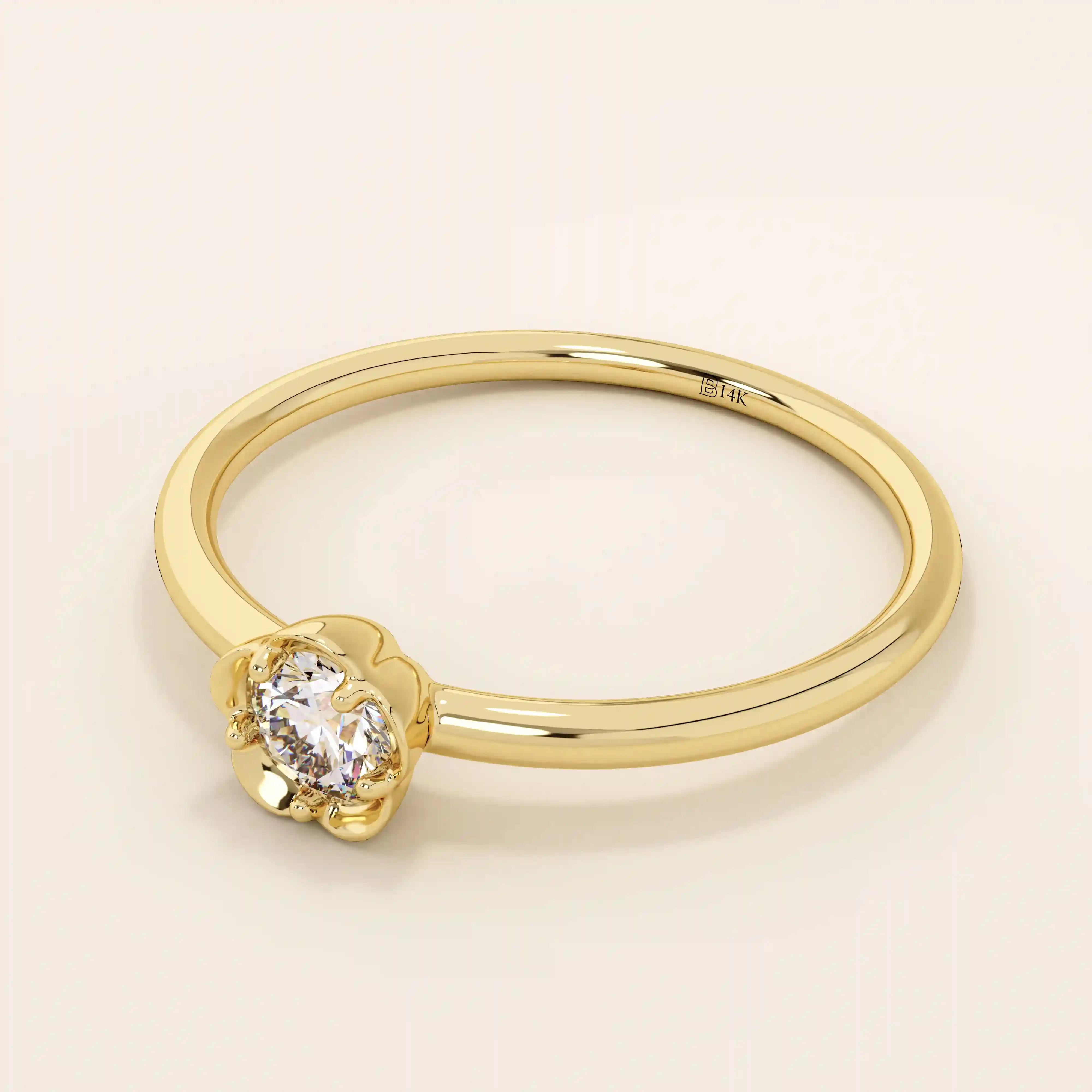 14k solid gold solitaire engagement or promise ring featuring a delicate small flower design. Minimalist and feminine everyday jewelry.