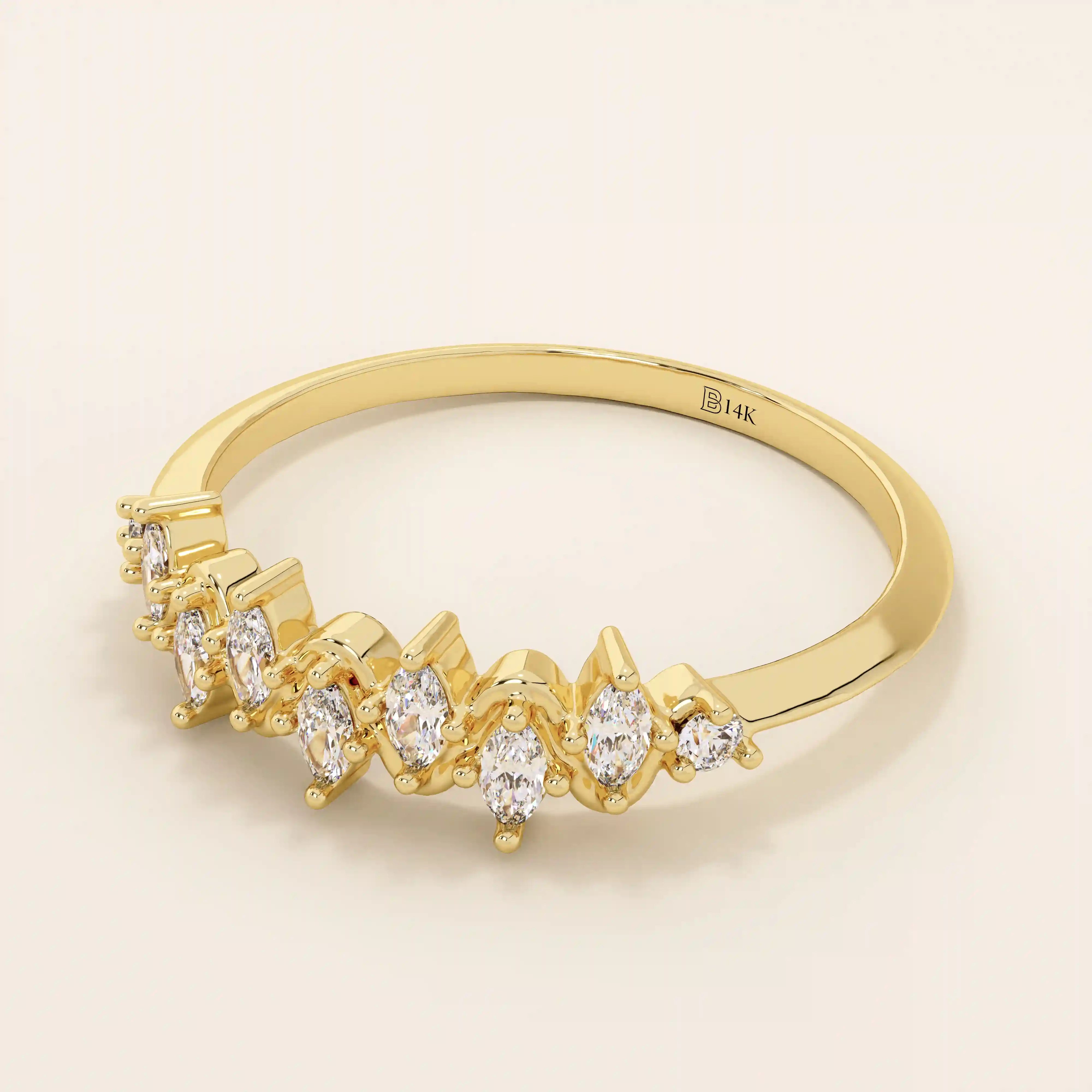 14k solid gold stacking ring with ups and downs design, paved with marquise-cut moissanites. A unique and elegant textured band.