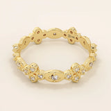 14k solid gold statement ring featuring a delicate leaf design with a sparkling moissanite. Minimalist and nature-inspired jewelry.