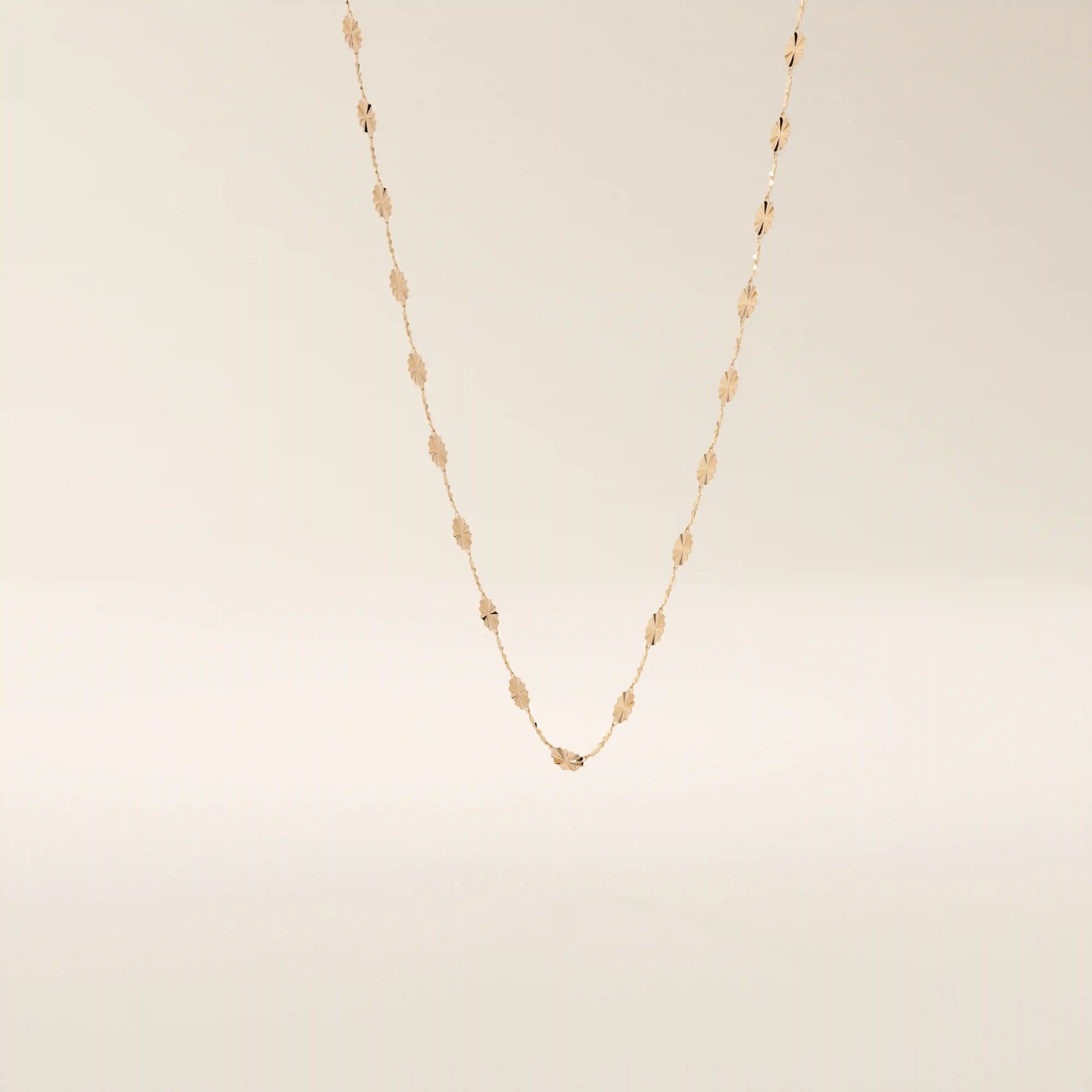 14k solid gold textured chain necklace with subtle shine and detailed finish. A classic gold chain with a unique touch. Great for everyday wear or layering.