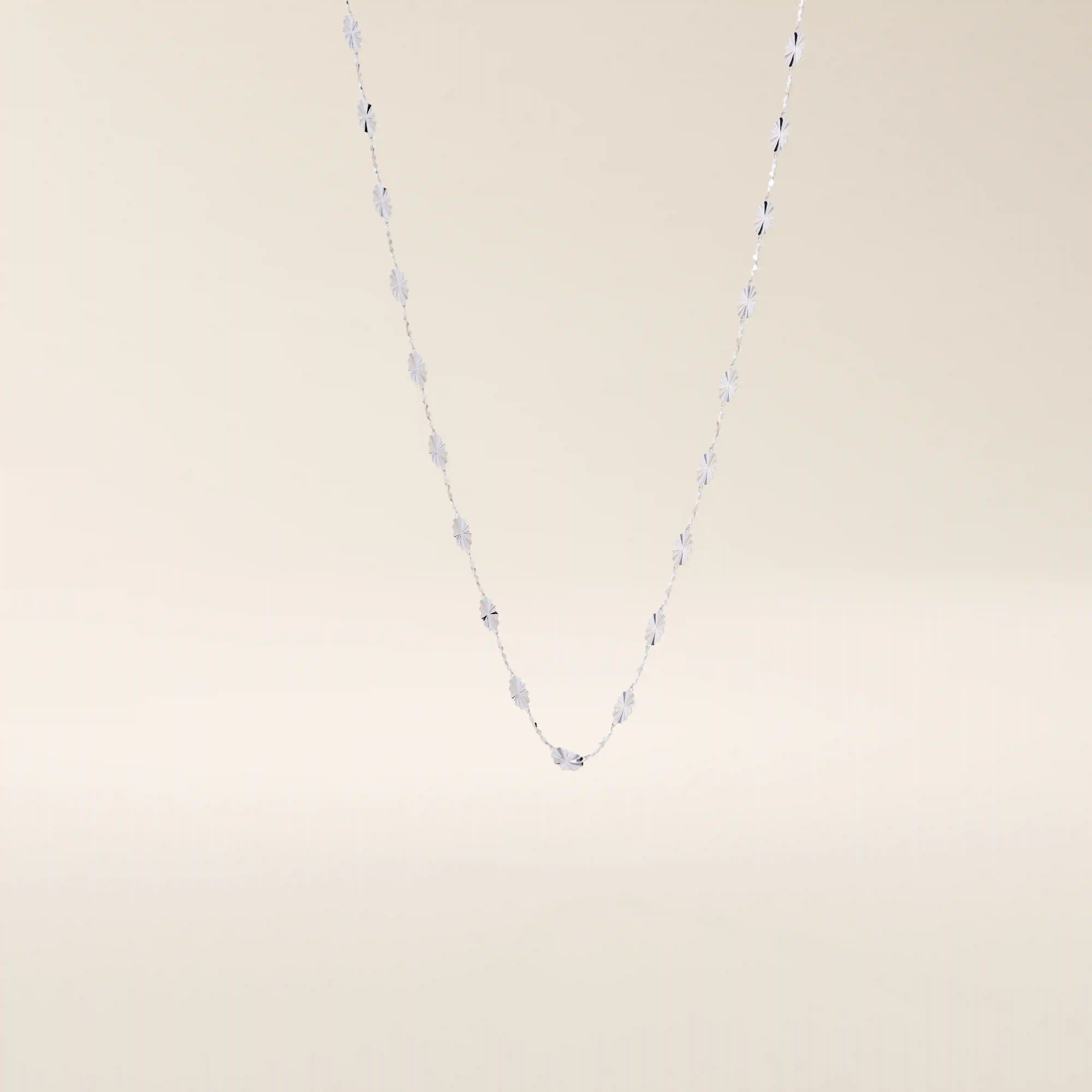 14k solid gold textured chain necklace with subtle shine and detailed finish. A classic gold chain with a unique touch. Great for everyday wear or layering.