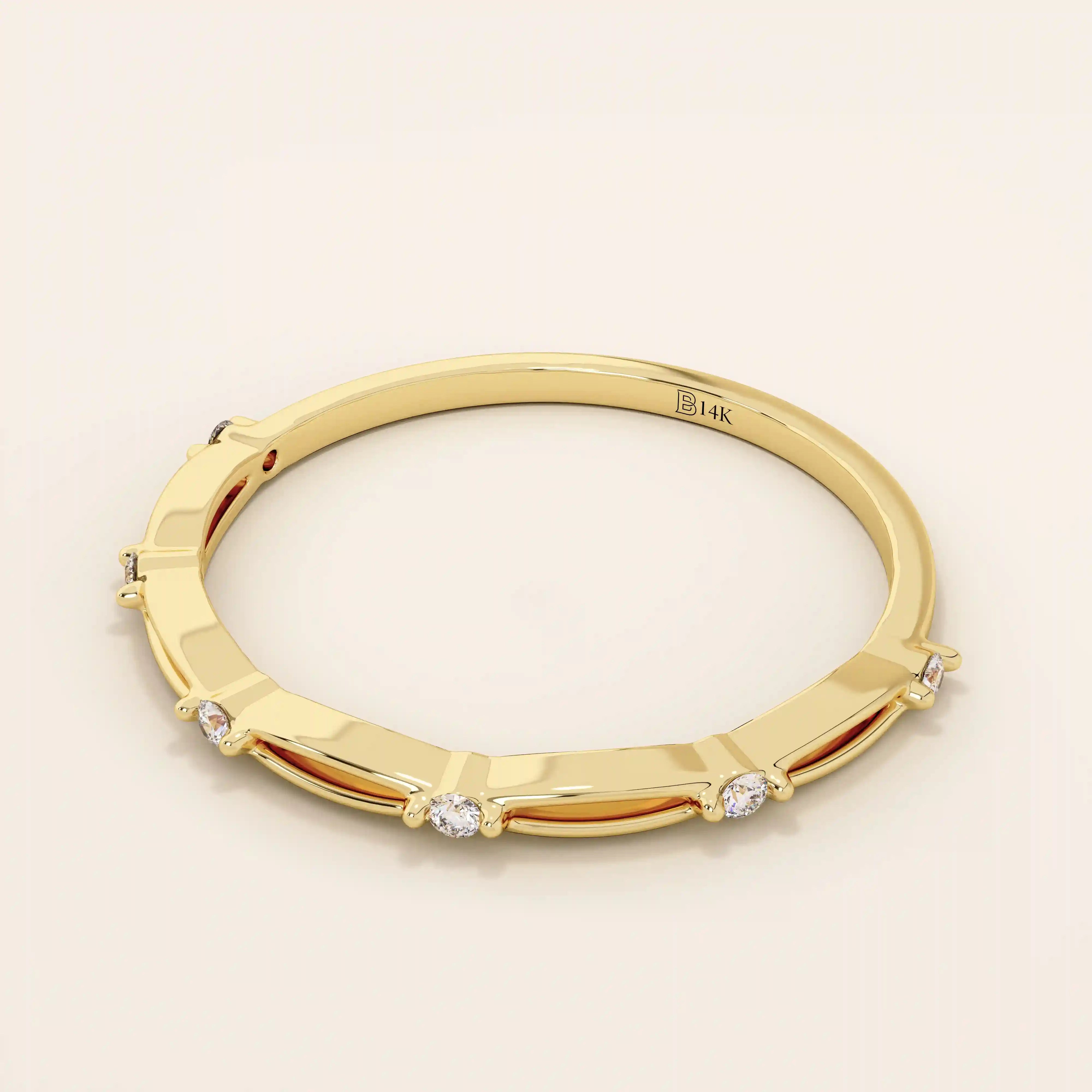 14k solid gold thin stacking ring with a minimalist design. A simple and elegant band perfect for layering.
