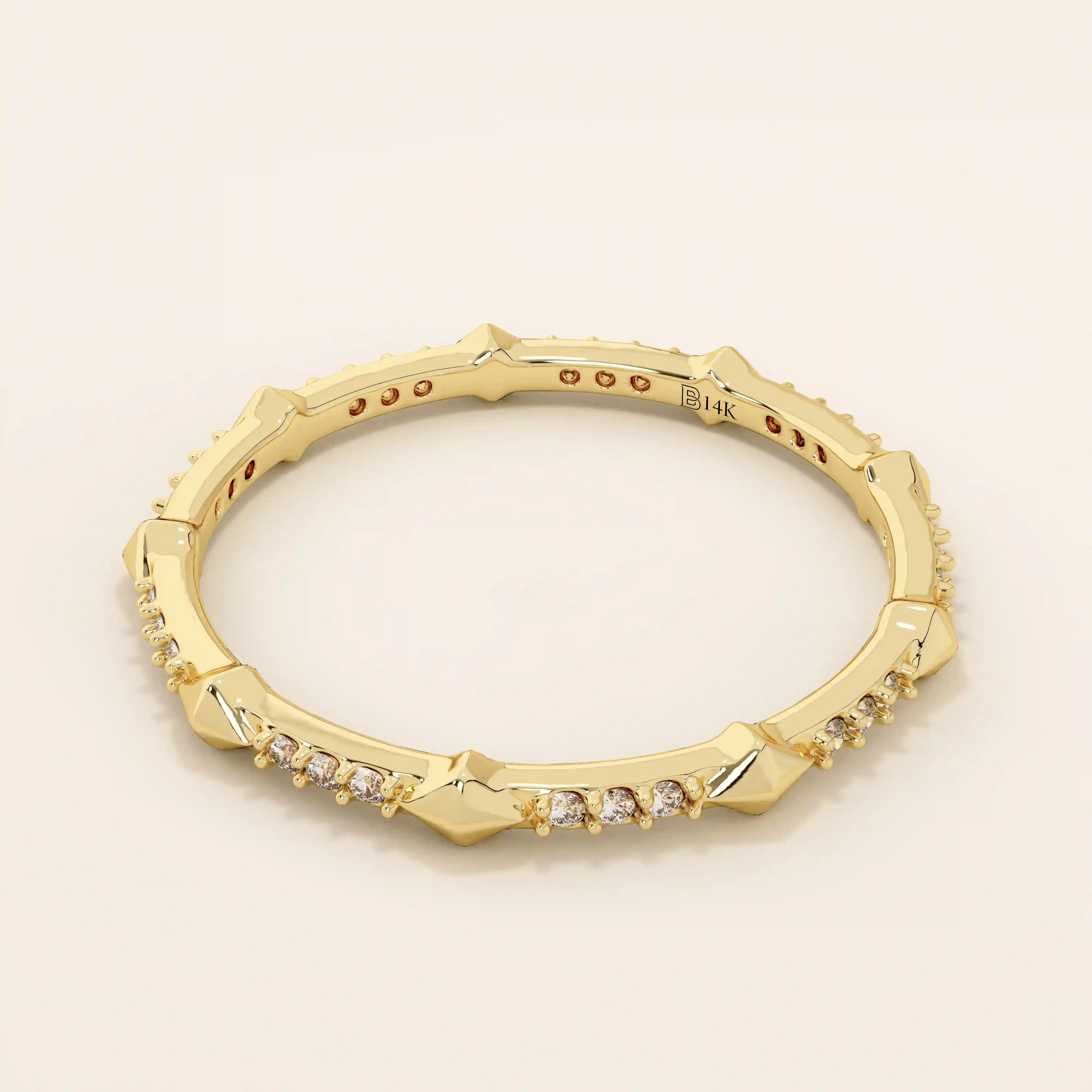 14k solid gold ultra-slim stacking ring with an eternity spike design. Minimalist gold ring for layering or everyday wear.