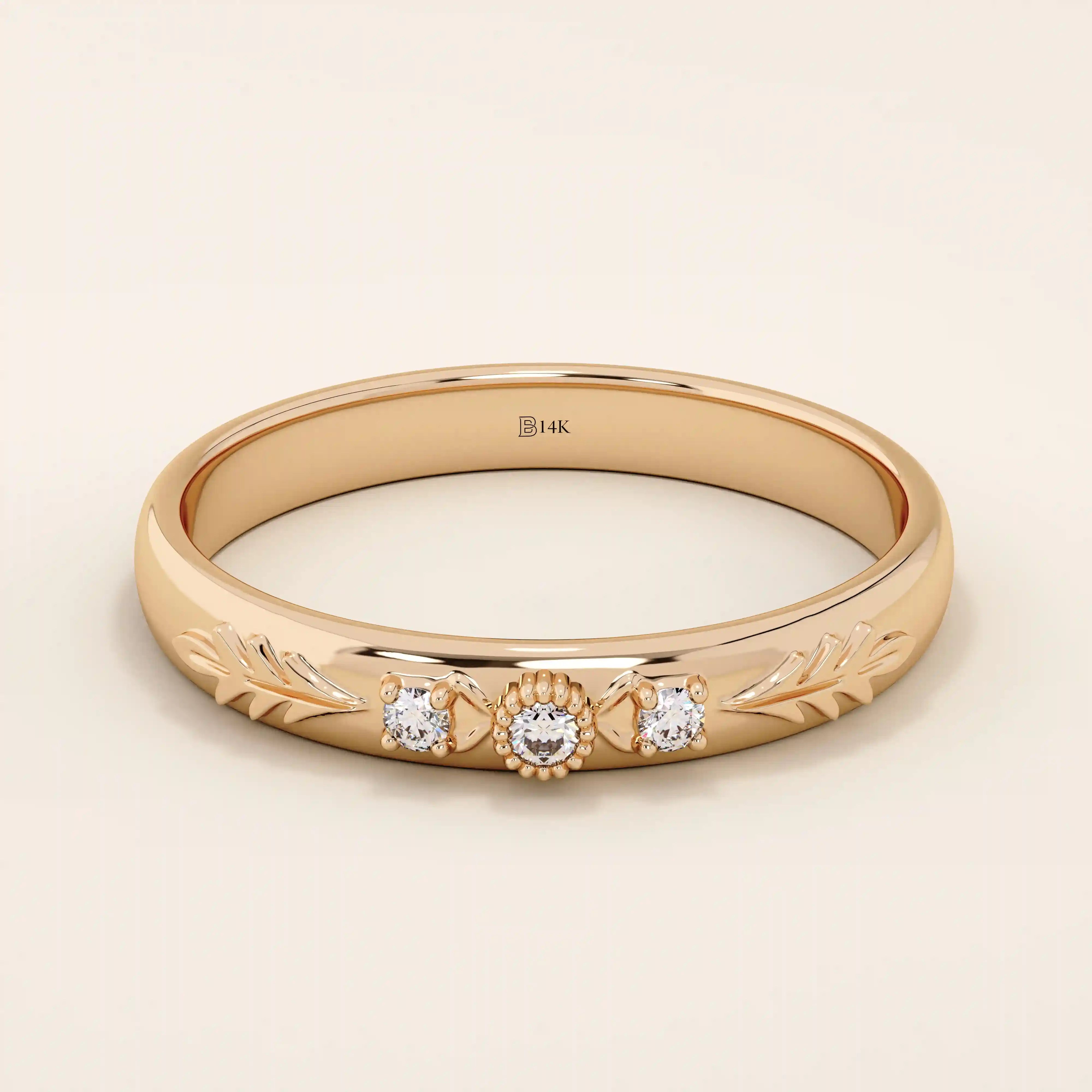 14k solid gold vintage-style leaf band promise ring with intricate botanical engraving. A timeless and elegant symbol of love and nature.