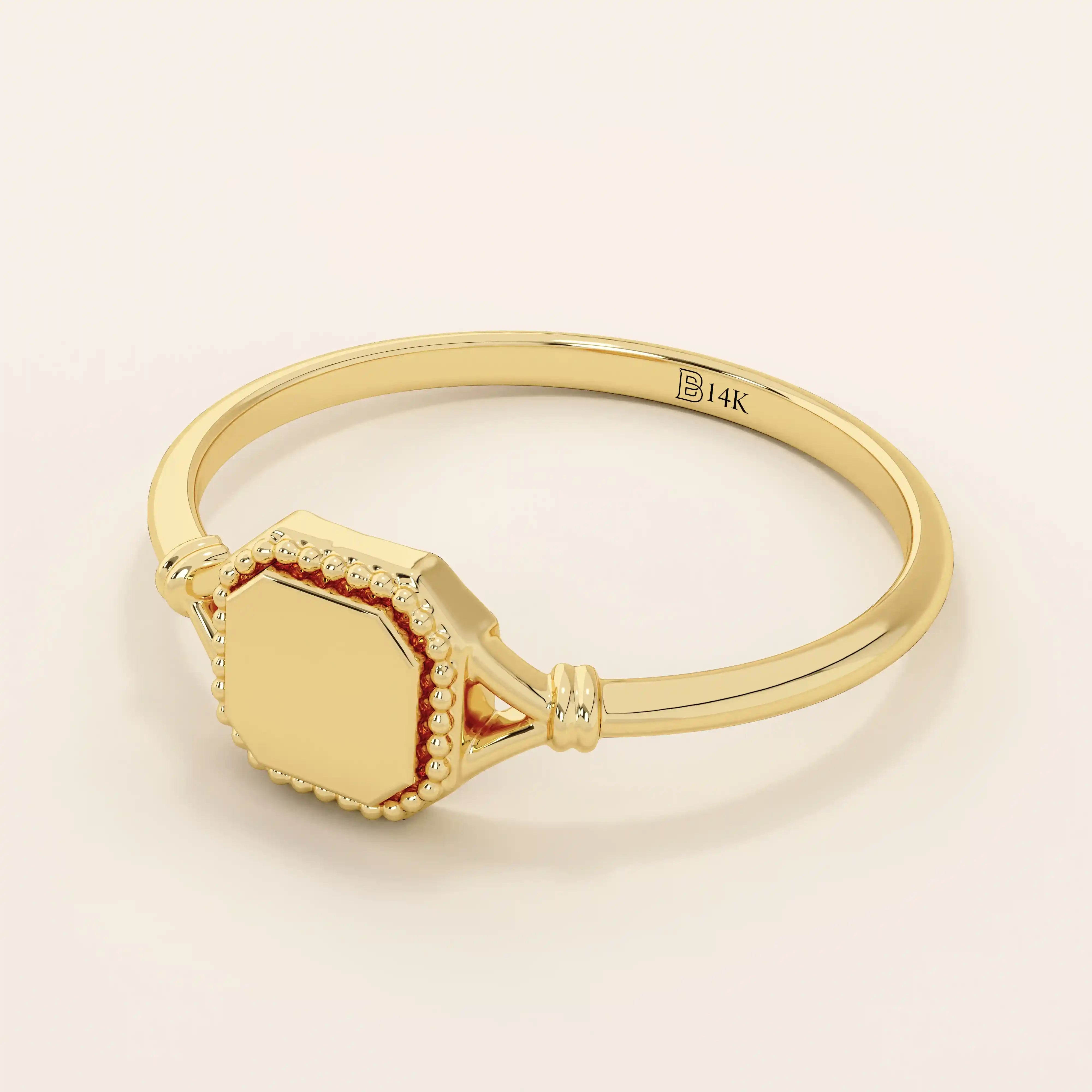 14k solid gold vintage-style square-shaped signet ring with classic detailing. Timeless and elegant design for everyday wear.